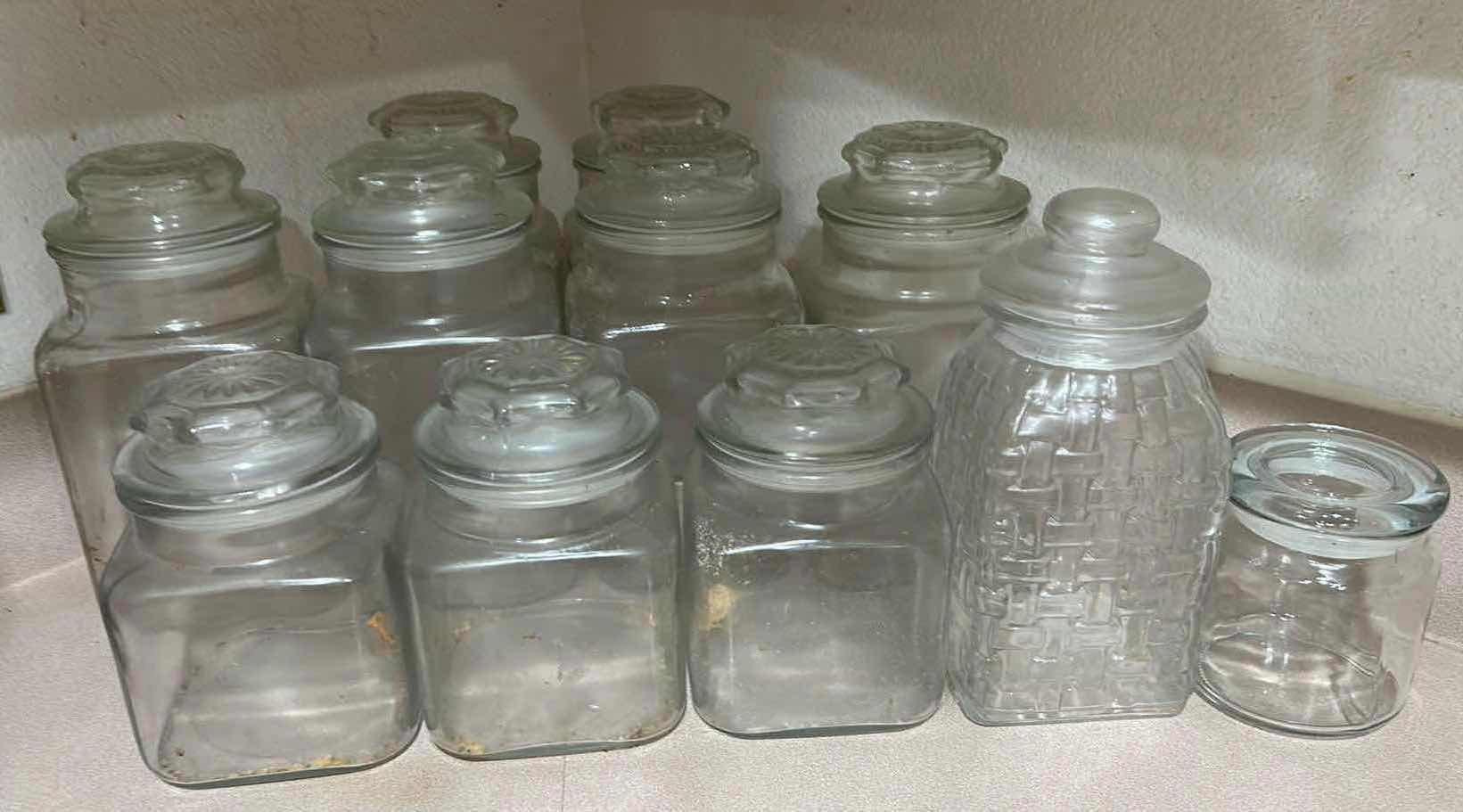 Photo 1 of 11- ASSORTMENT OF CLEAR GLASS CANISTERS