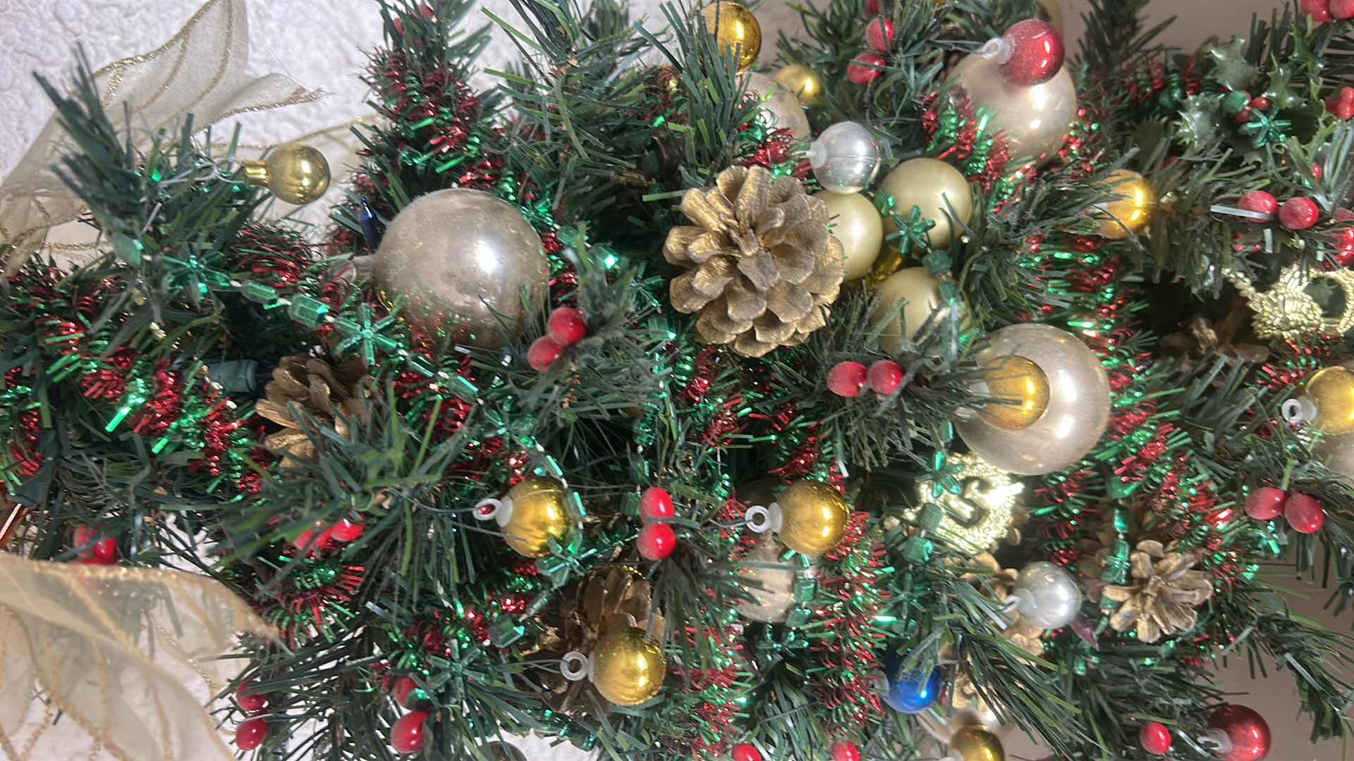Photo 1 of DECORATED MINATURE CHRISTMAS TREE W GOLD RIBBON BOW H21”