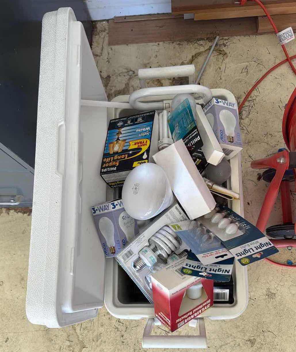 Photo 1 of IGLOO COOLER W/ ASSORTED LIGHT BULBS