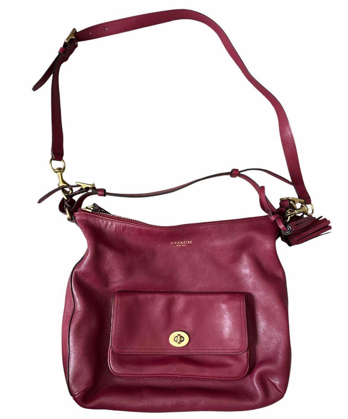 View 1 of COACH LEGACY FUCHSIA LEATHER DUFFLE SHOULDER / CROSSBODY BAG-NOT AUTHENTICATED