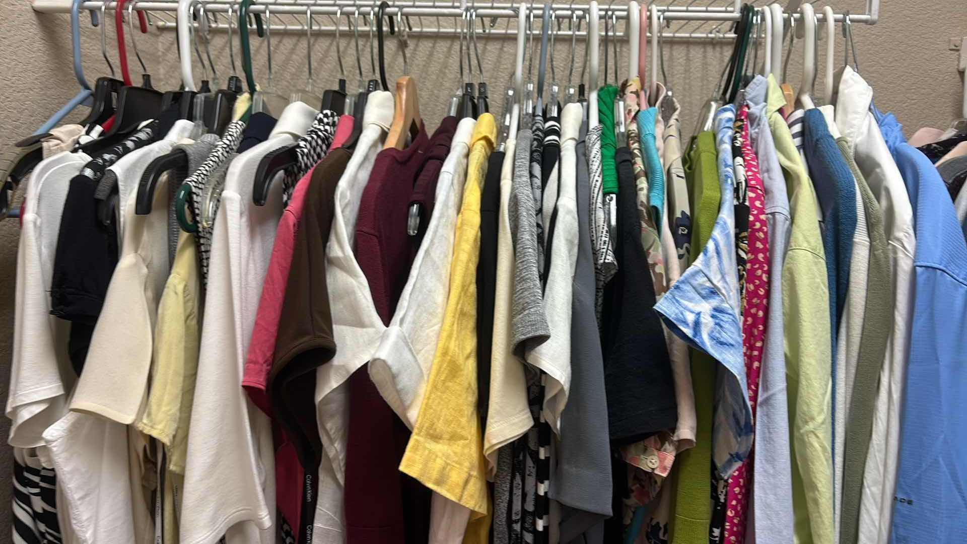 Photo 1 of CONTENTS OF PRIMARY CLOSET WOMENS TOPS SLEEVLESS, LONG SLEEVE VARIOUS SIZES S-L
