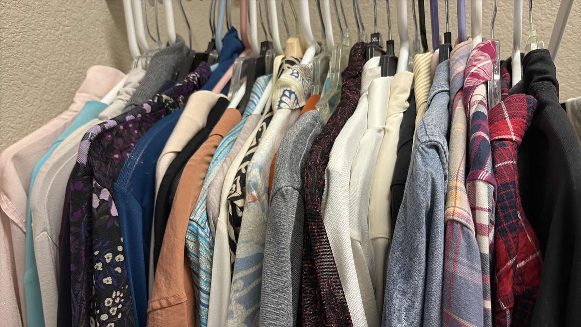 Photo 1 of CONTENTS OF PRIMARY CLOSET WOMENS TOPS- LONG SLEEVE SIZE S-L