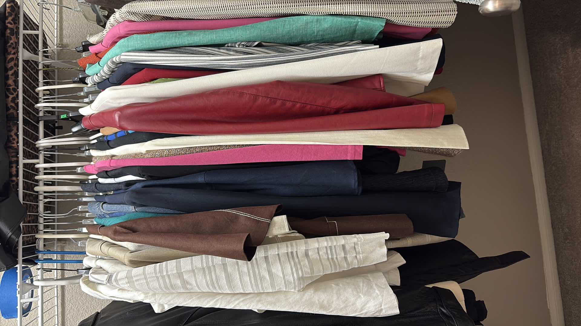 Photo 1 of CONTENTS OF PRIMARY CLOSET WOMENS SWEATERS AND JACKETS SIZE S-L