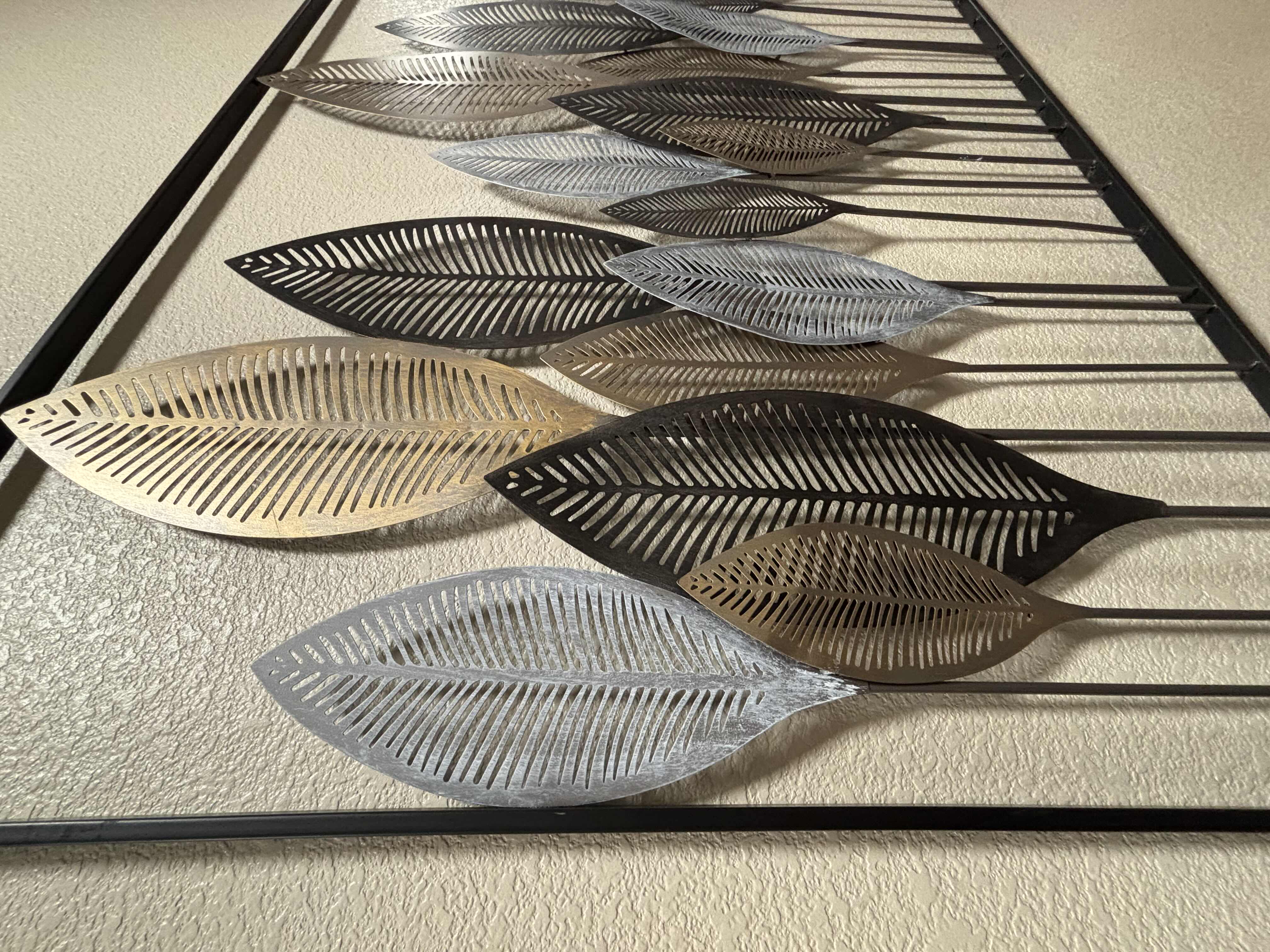Photo 1 of GRAYSON METAL LEAF WALL ART 59” X 37” $182