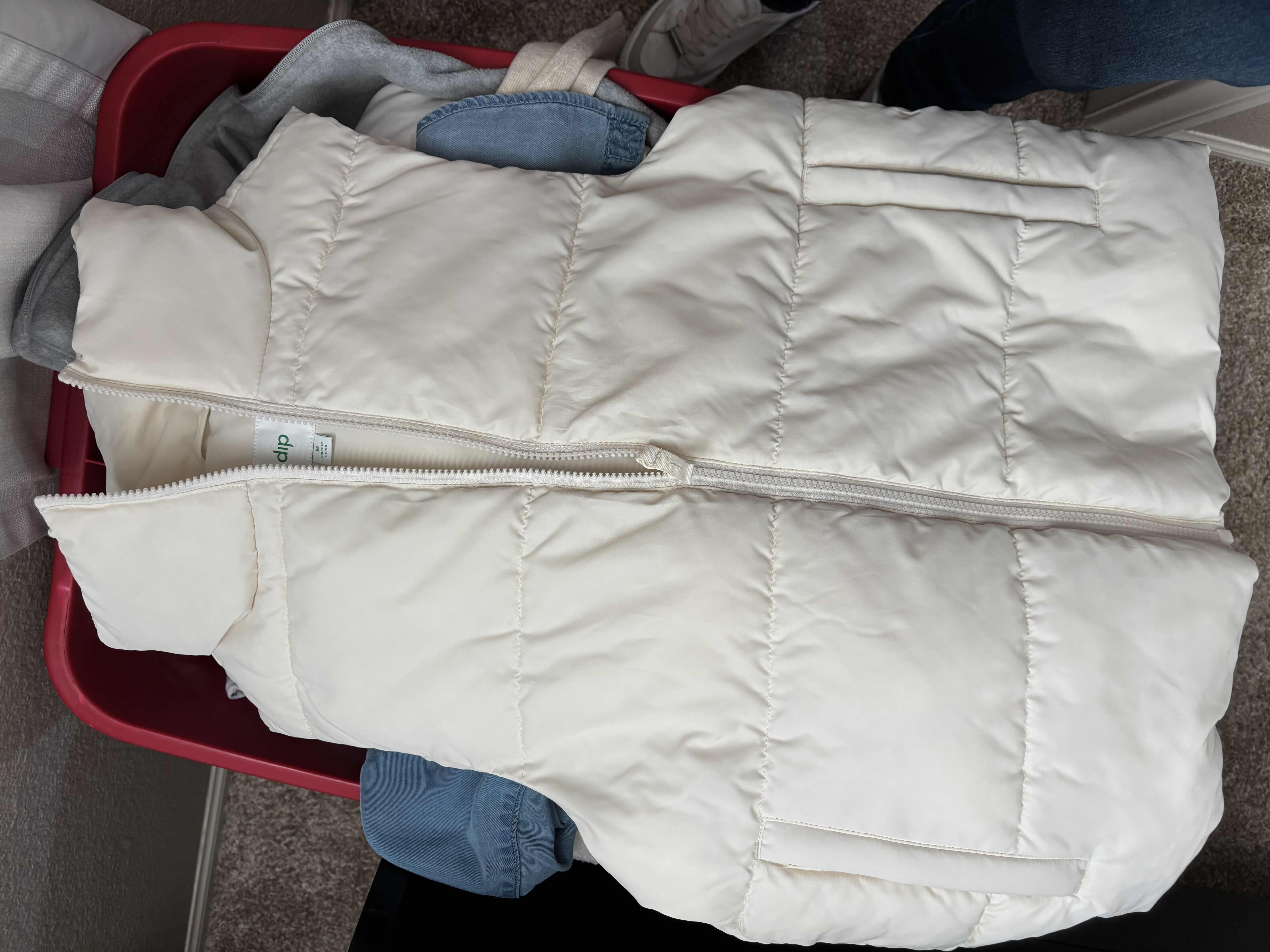Photo 1 of CONTAINER FULL OF WOMENS CLOTHES