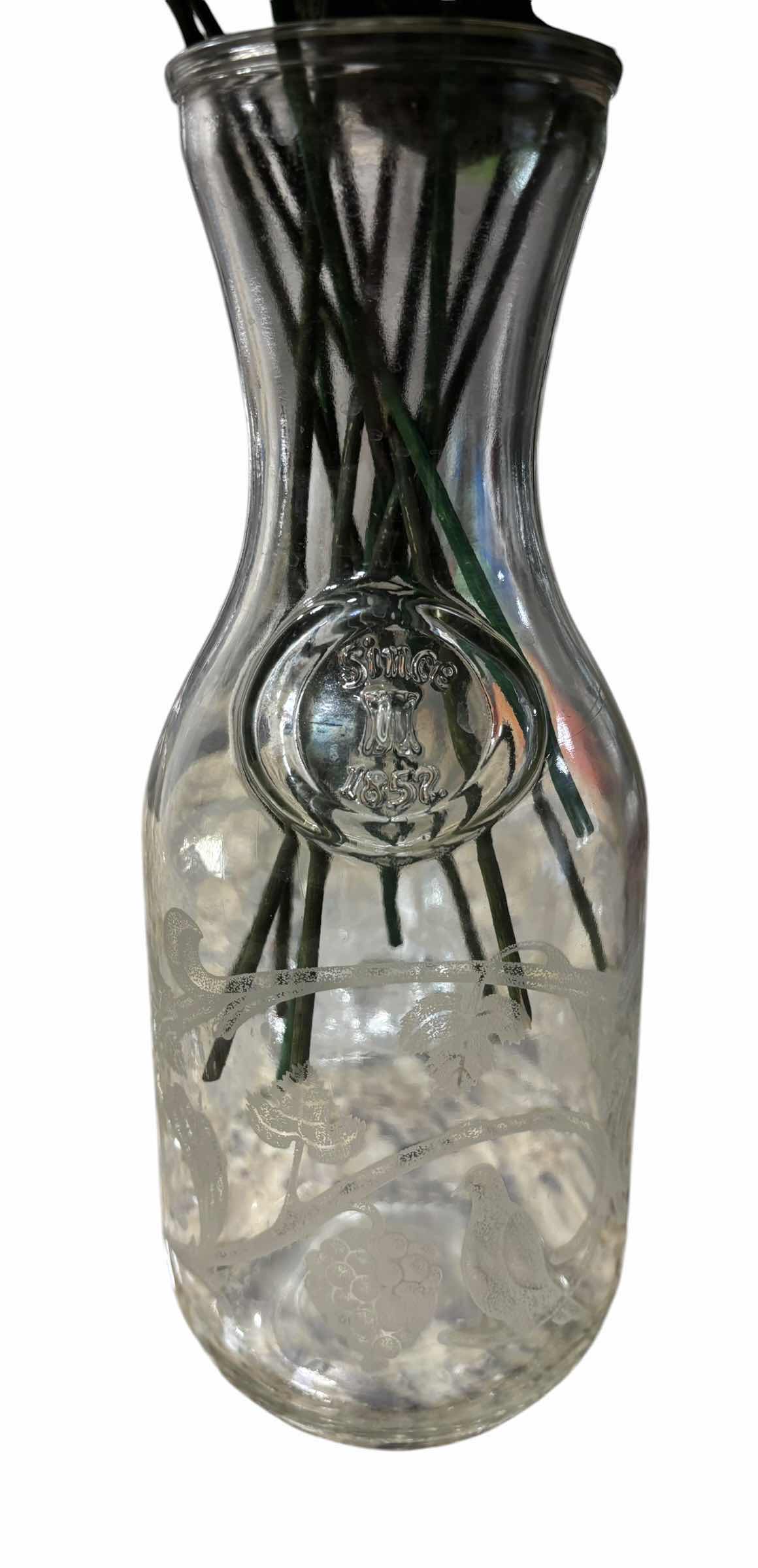 Photo 1 of THREE GLASS VASES WITH CROCHETED AND ARTIFICIAL FLOWERS, TALLEST H18”