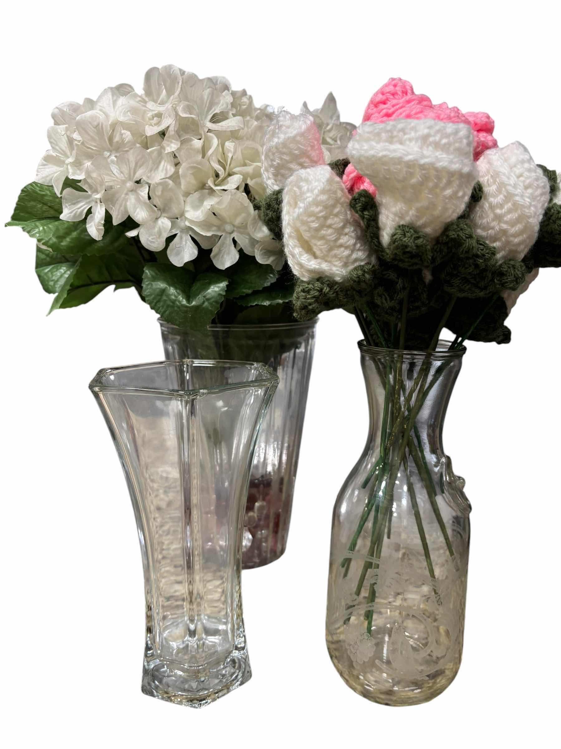 Photo 1 of THREE GLASS VASES WITH CROCHETED AND ARTIFICIAL FLOWERS, TALLEST H18”