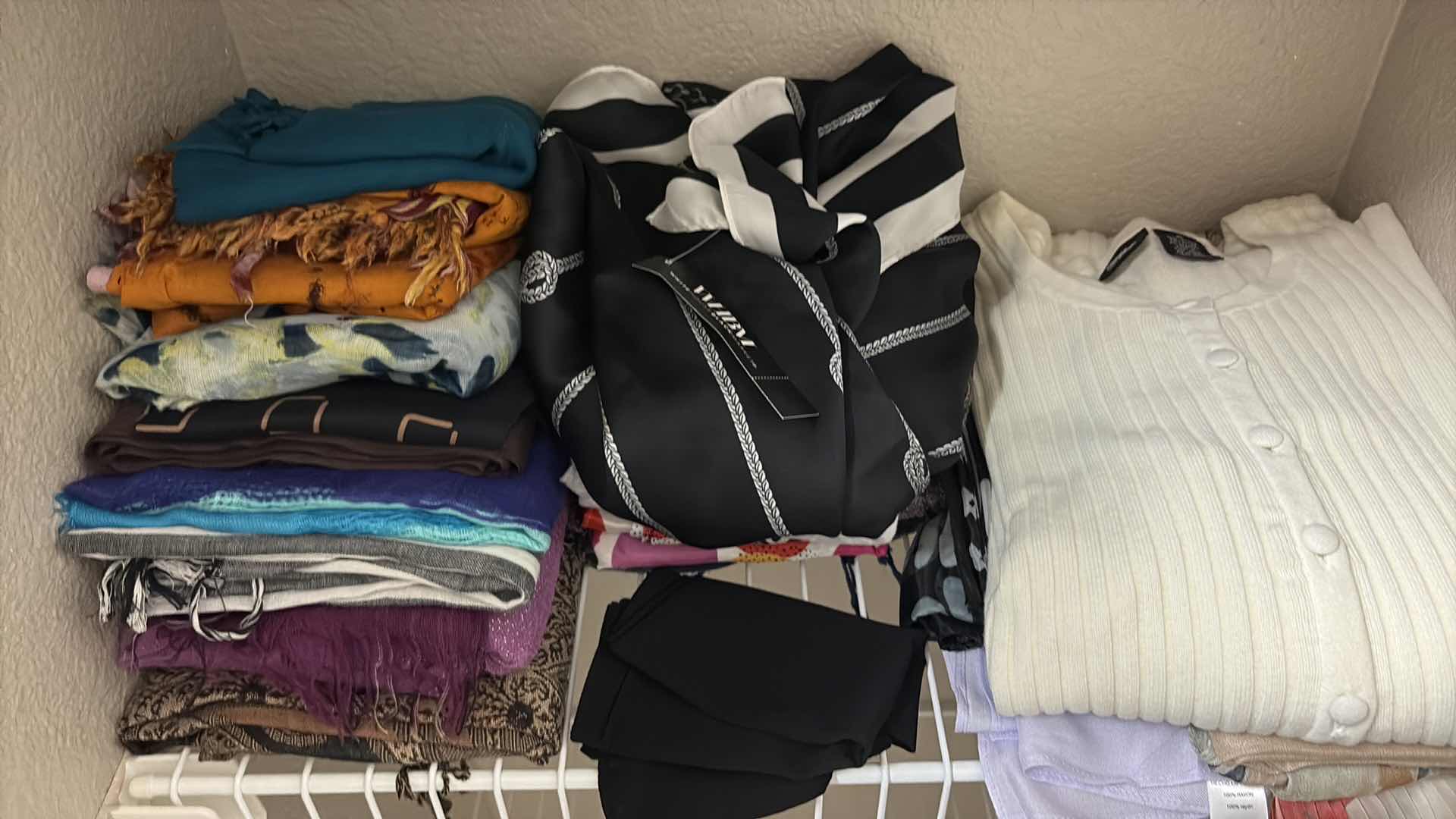 Photo 1 of CONTENTS OF PRIMARY CLOSET WOMENS SWEEATERS & SCARVES SIZE S-XL