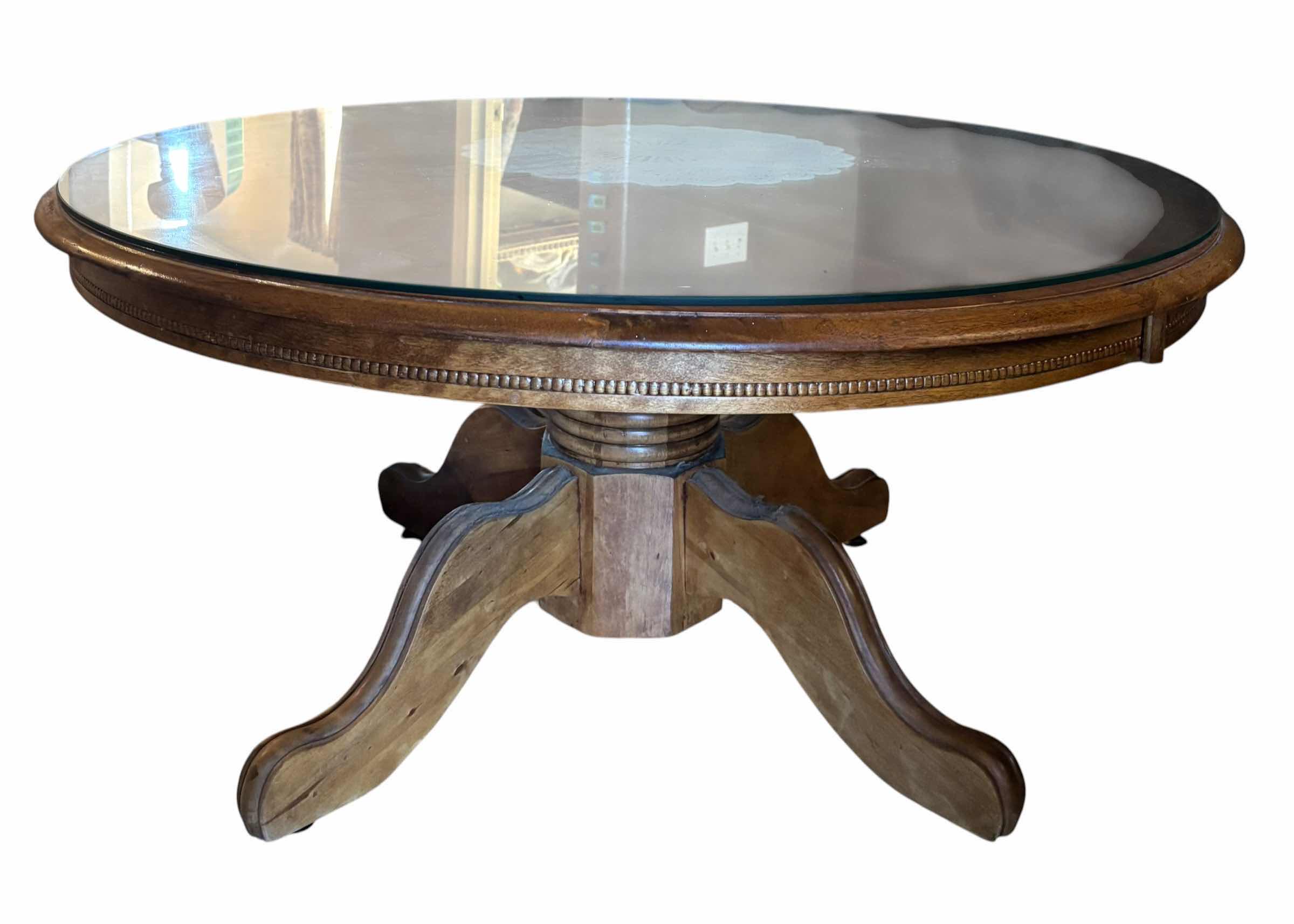 View 1 of ROUND WOOD COFFEE TABLE WITH GLASS TOP 40”D