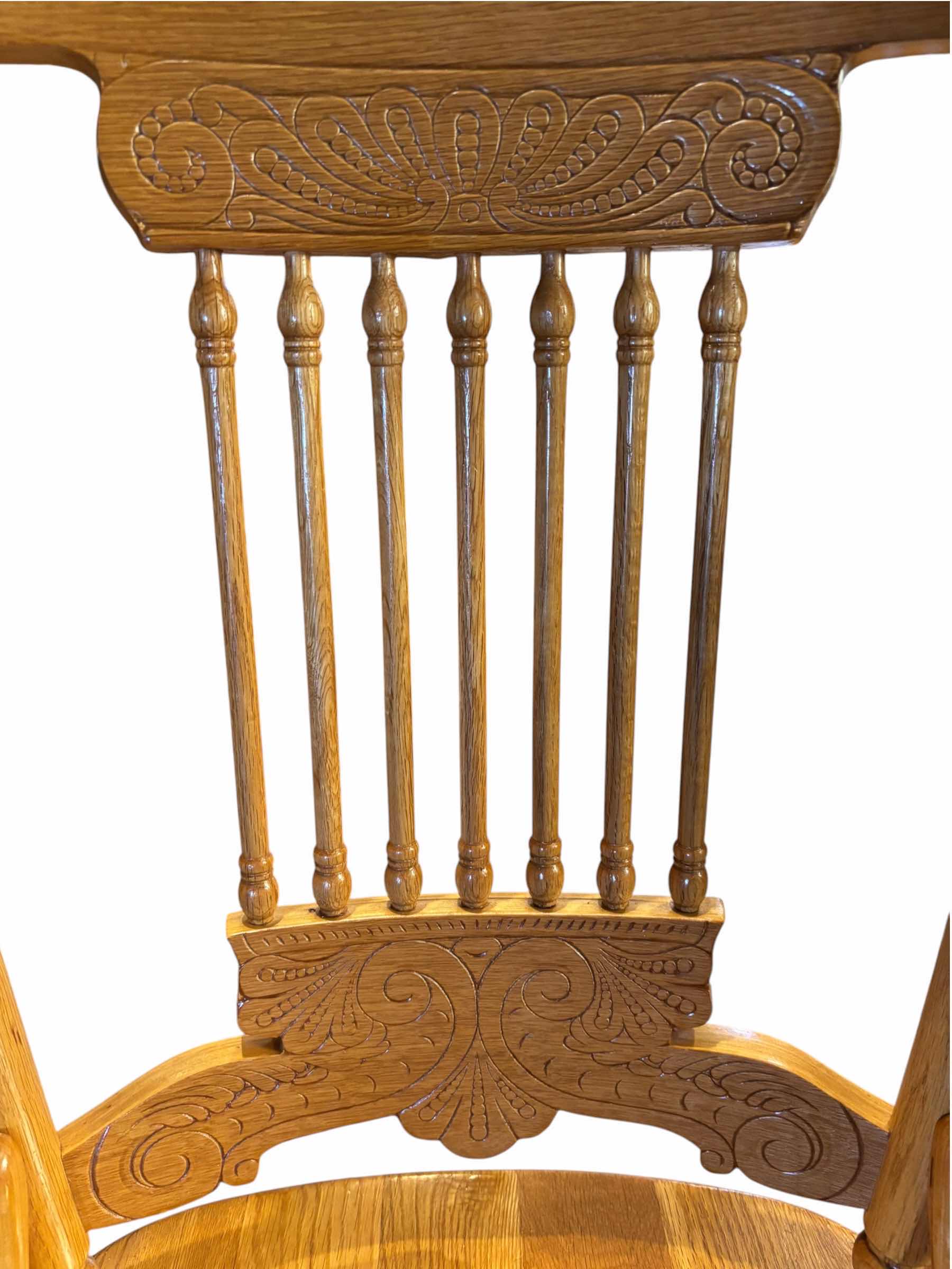 View 2 of VINTAGE SOLID OAK DINING CHAIR WITH TURNED SPINDLES & EMBOSSED FLORAL SCROLL CARVINGS $356