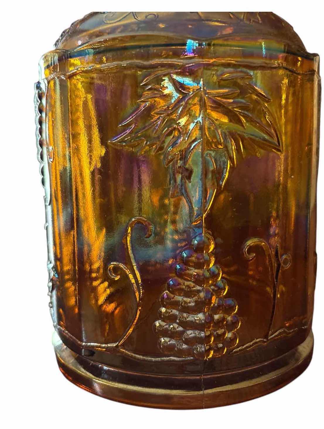View 3 of IRIDESCENT CARNIVAL GLASS LIDDED CANISTER WITH EMBOSSED GRAPE & VINE DESIGN H8.5”