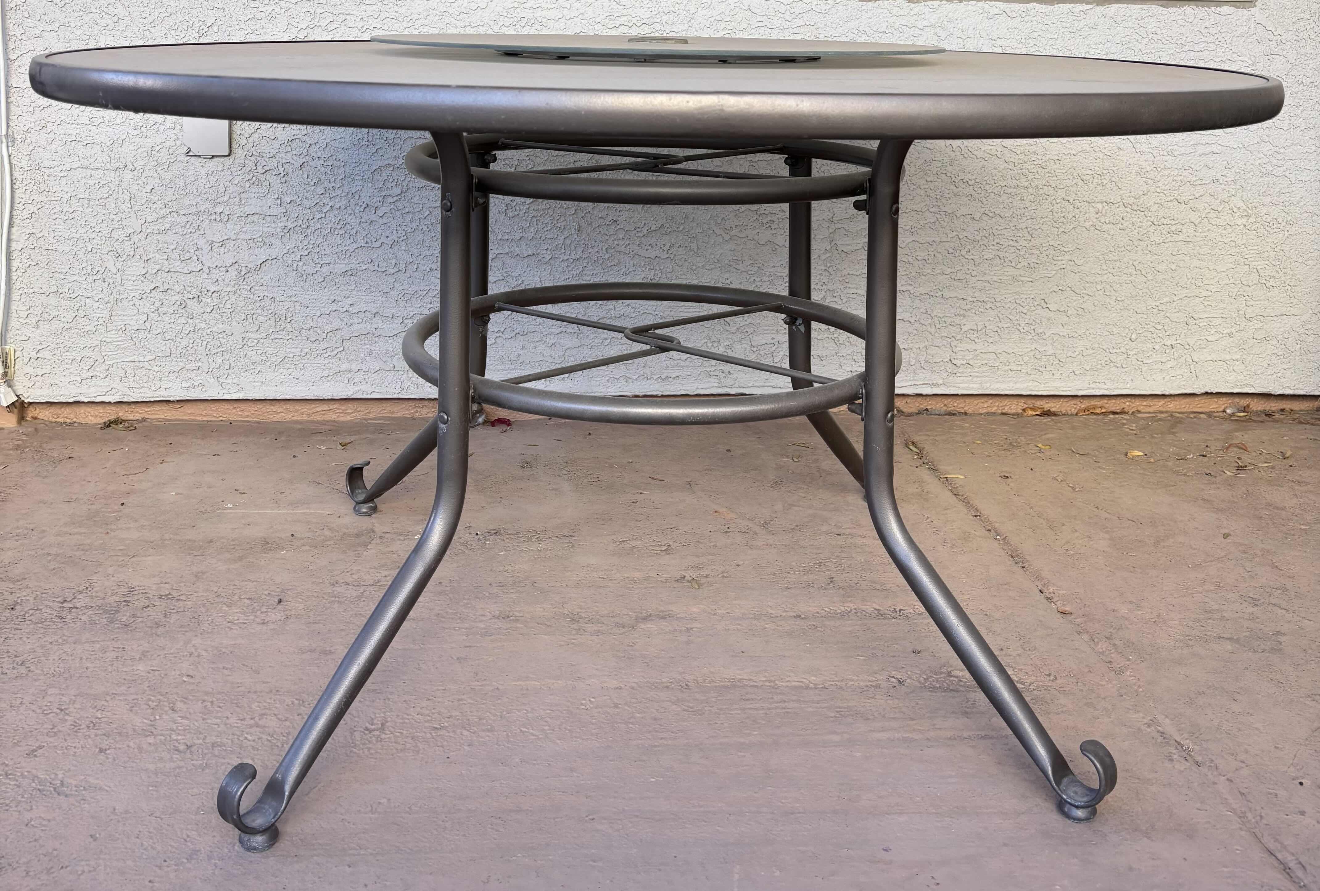 View 1 of METAL OUTDOOR PATIO TABLE WITH GLASS TOP AND BUILT IN GLASS LAZY SUSAN $2359