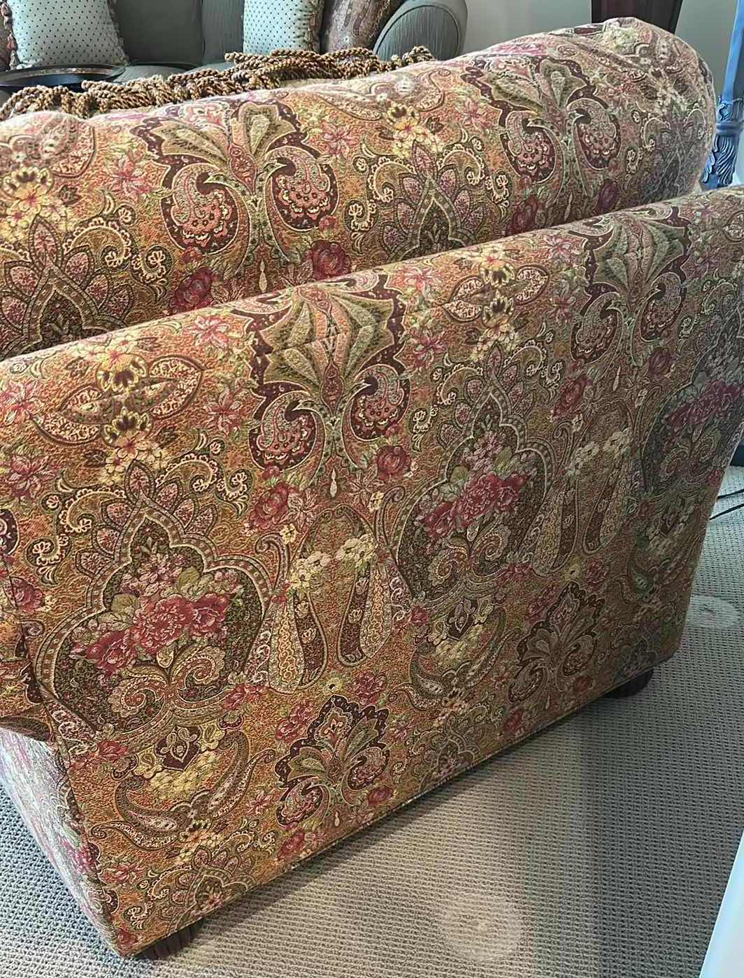 Photo 1 of ETHAN ALLEN ARMCHAIR W PLUSH OVERSIZED MULTI COLORED PAISLEY FABRIC W MATCHING DECORATIVE FRINGE PILLOWS 42" X 39" H 32" SEE NOTES
