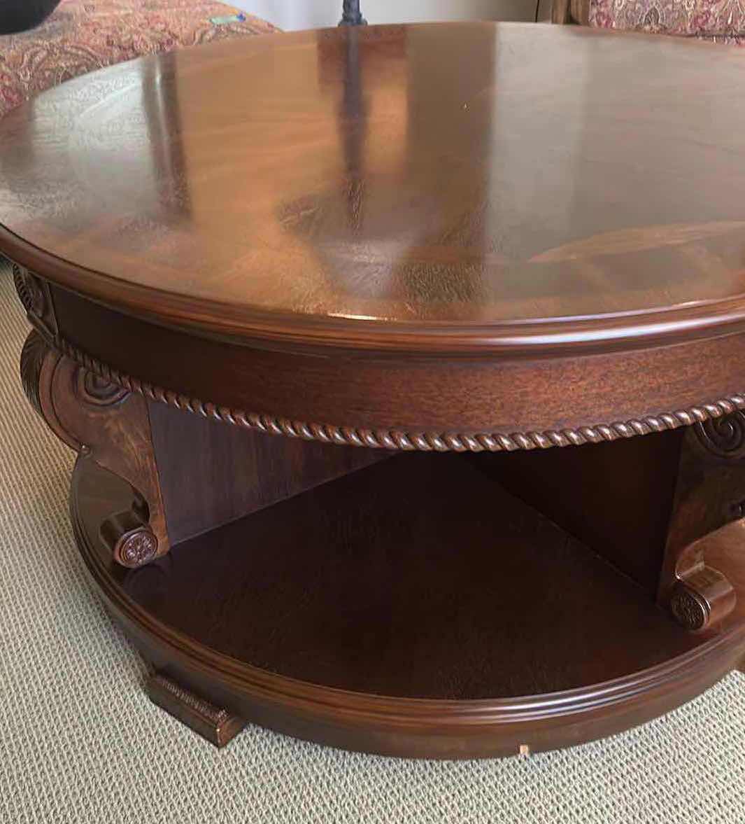 Photo 1 of MAHOGANY REEDED 41" ROUND SWIVEL COCKTAIL TABLE W INTRICATE REEDING AROUND BASE H 23" SEE NOTES