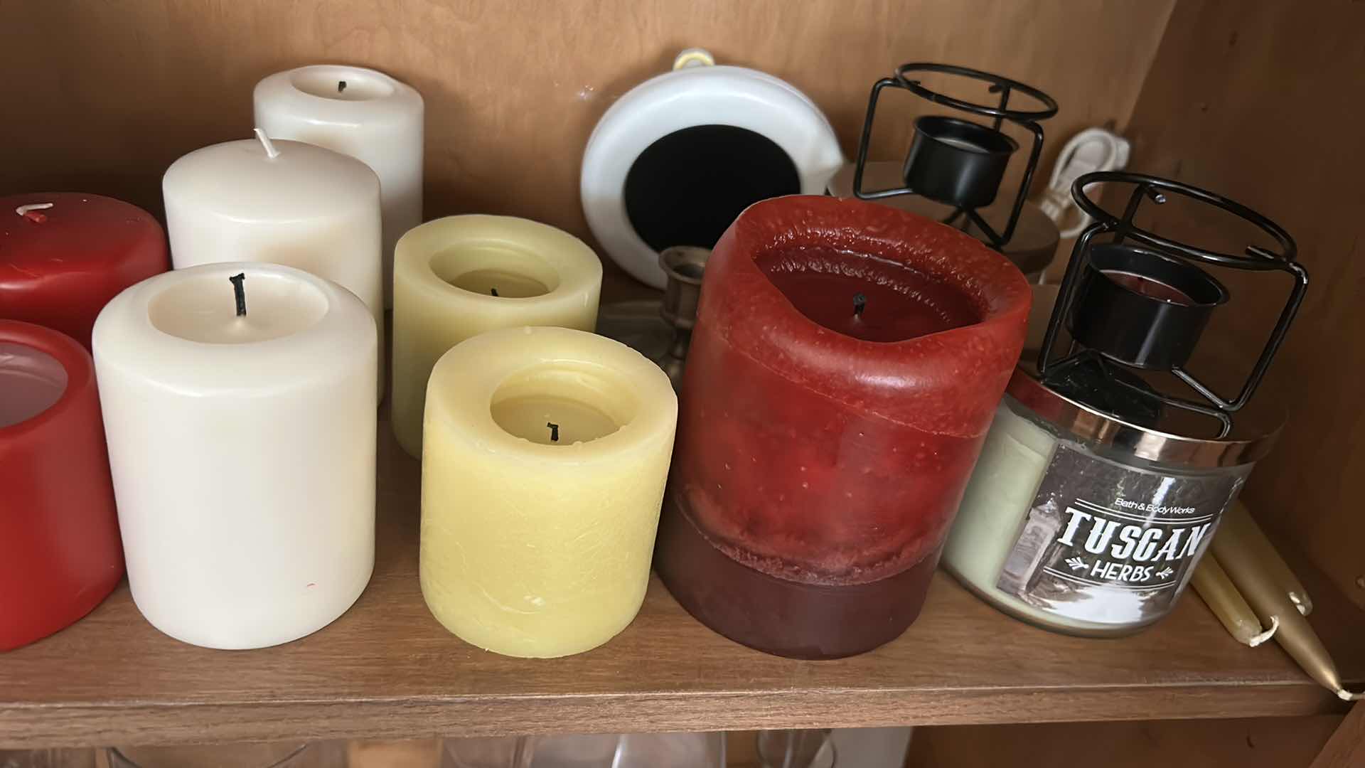 Photo 1 of CONTENTS OF SHELF ASSORTED CANDLES