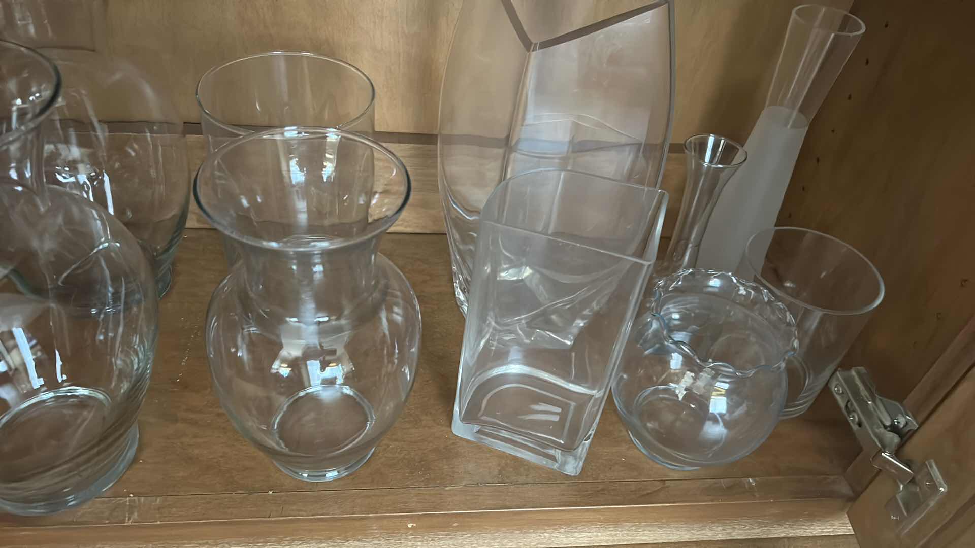 Photo 1 of CONTENTS OF SHELF CLEAR GLASS VASES