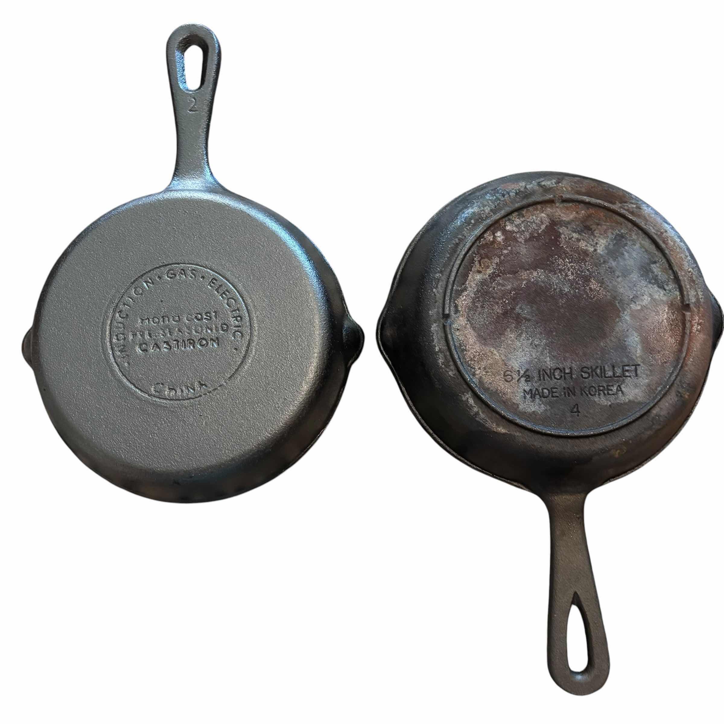 Photo 1 of CAST IRON SKILLETS (4), SMALLEST 6.5”D & LARGEST 7” X 9.5”