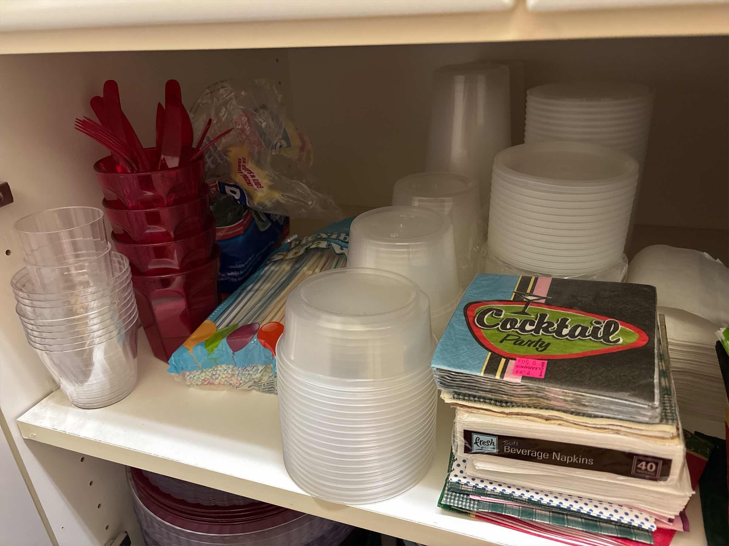 Photo 1 of ENTERTAINMENT SUPPLIES- CONTENTS OF CABINET
