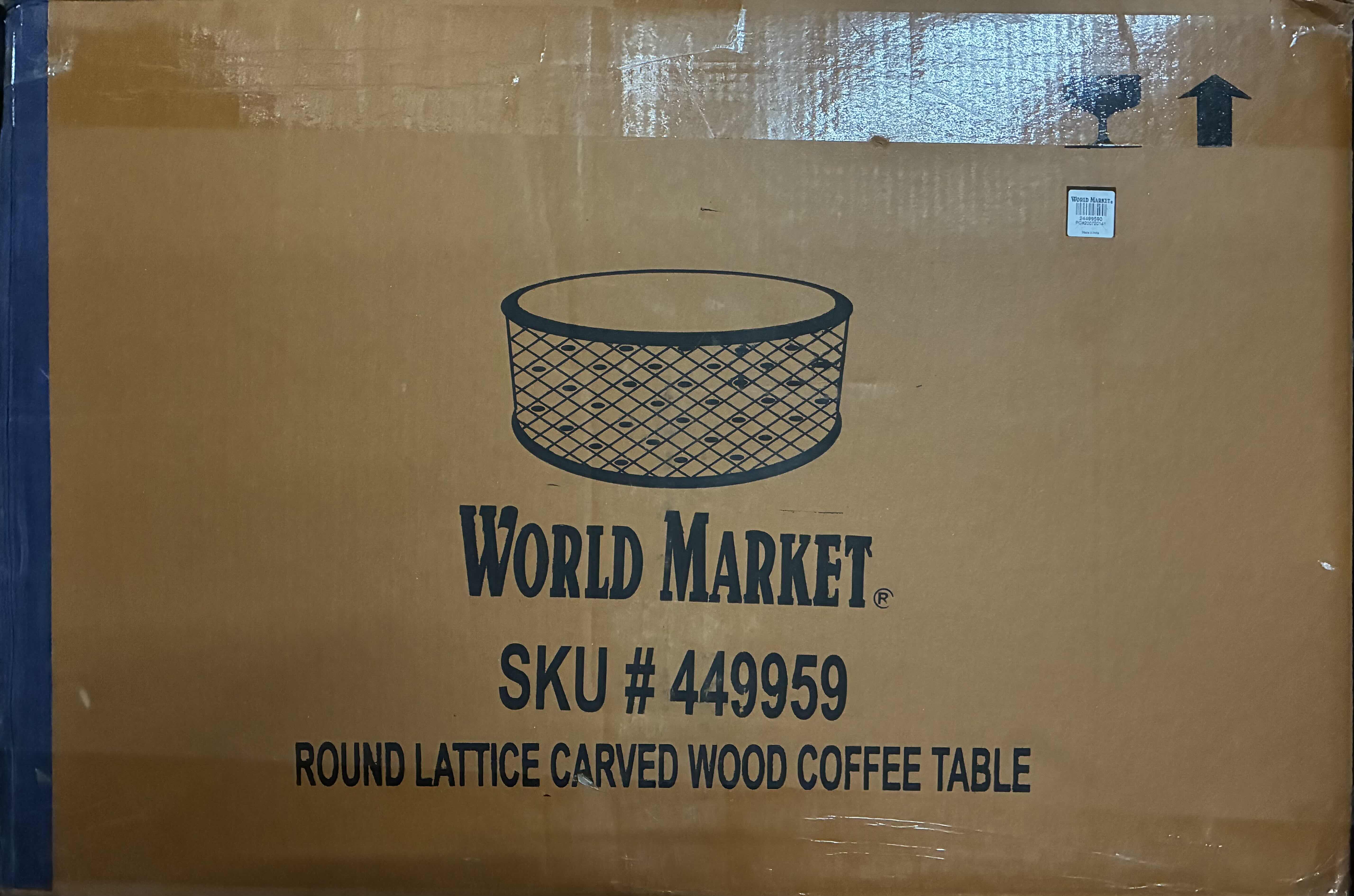 Photo 1 of WORLD MARKET ROUND LATTICE CARVED WOOD COFFEE TABLE