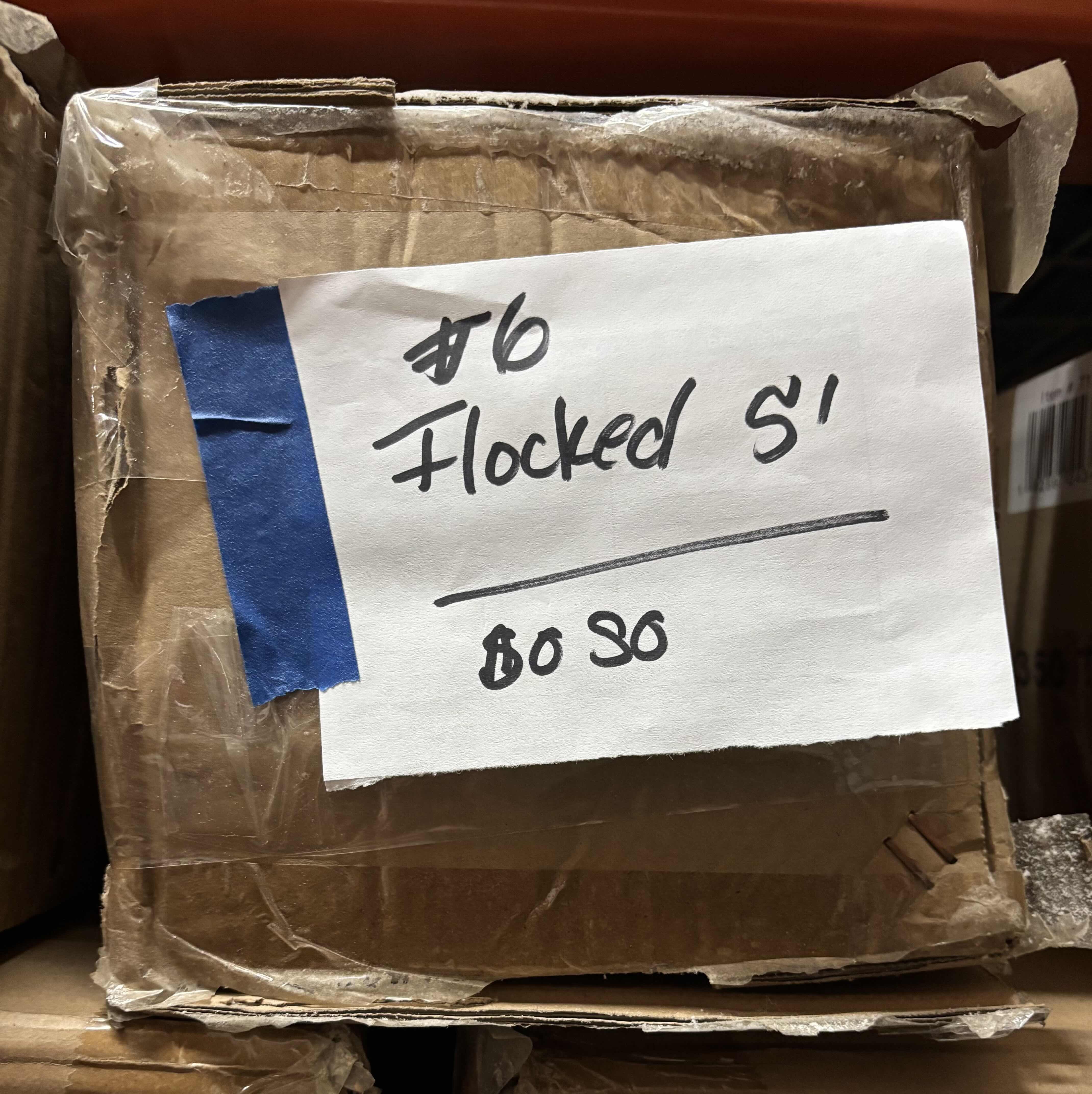 Photo 1 of FLOCKED 5’ CHRISTMAS TREE IN ORIGINAL BOX
