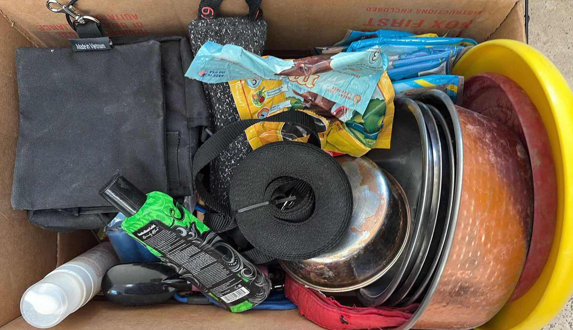 Photo 1 of BOX OF DOG ITEMS- LEASHES, BOWLS, POOP BAGS AND MORE