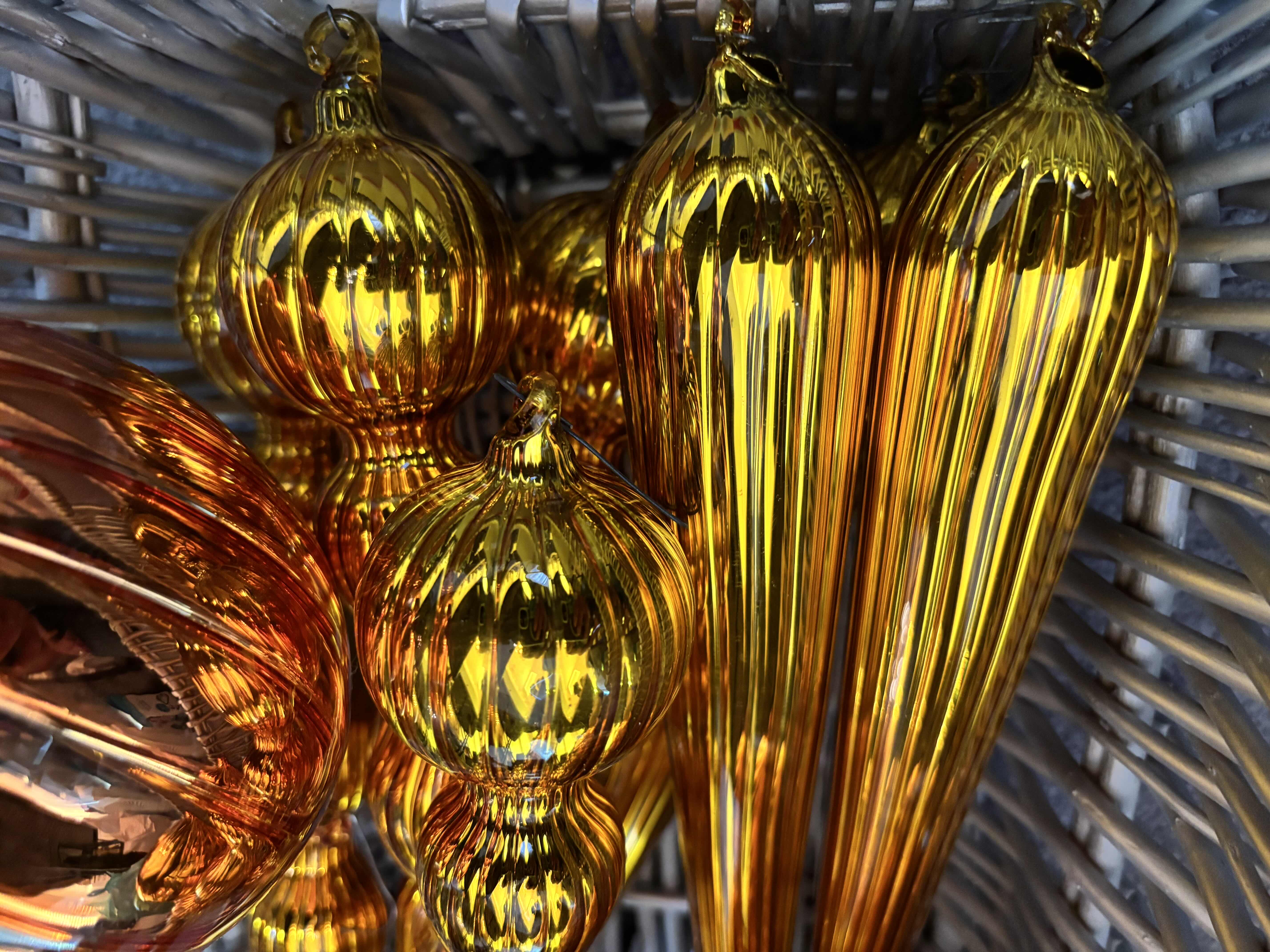 Photo 1 of BASKET OF ORANGE GLASS ORNAMENTS, LONGEST 12”L