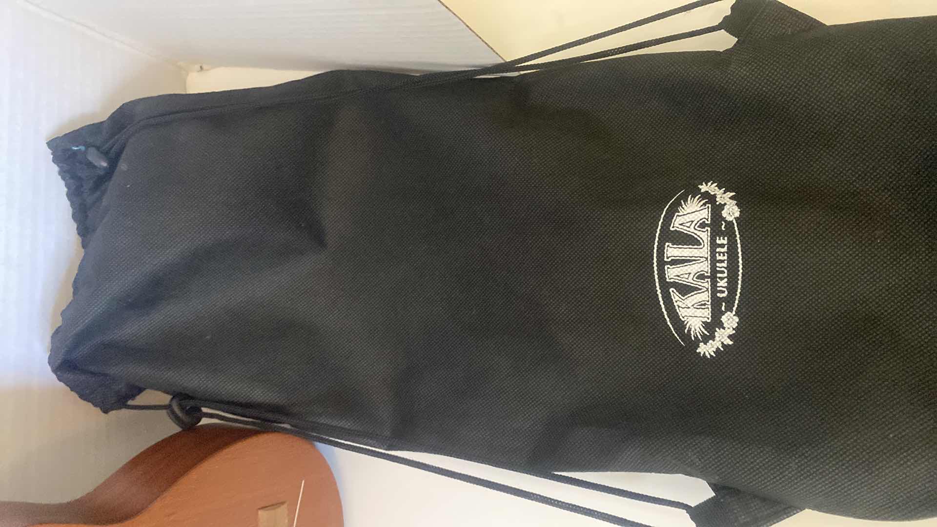 Photo 1 of WOOD CALLA UKULELE WITH STORAGE BAG