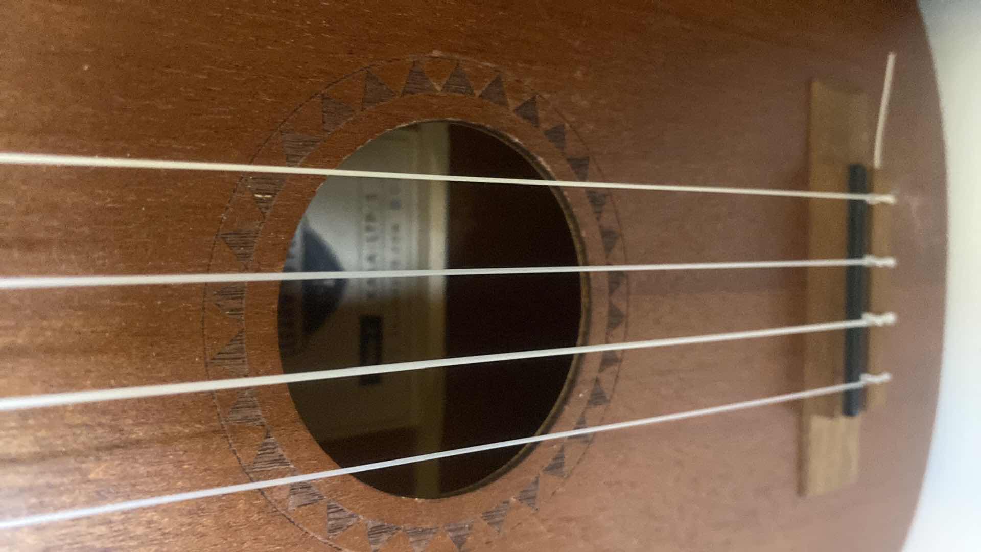 Photo 1 of WOOD CALLA UKULELE WITH STORAGE BAG