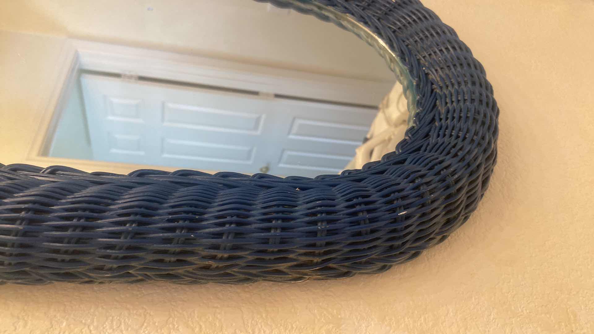 View 2 of OVAL MIRROR WITH BLUE WICKER FRAME 15“ X 20 1/2“