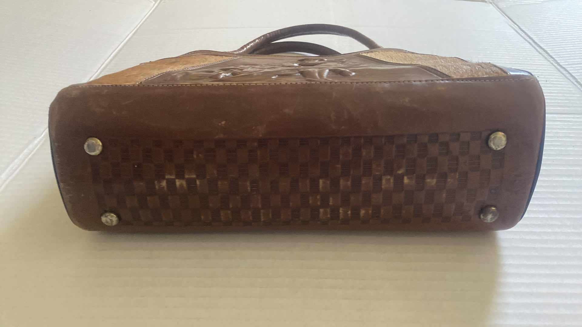 Photo 1 of VINTAGE WOMEN’S MONT-ABUR MEXICAN HAND TOOL LEATHER HANDBAG 12 1/2” X 4” EACH 8 1/2“ EXCLUDING HANDLES