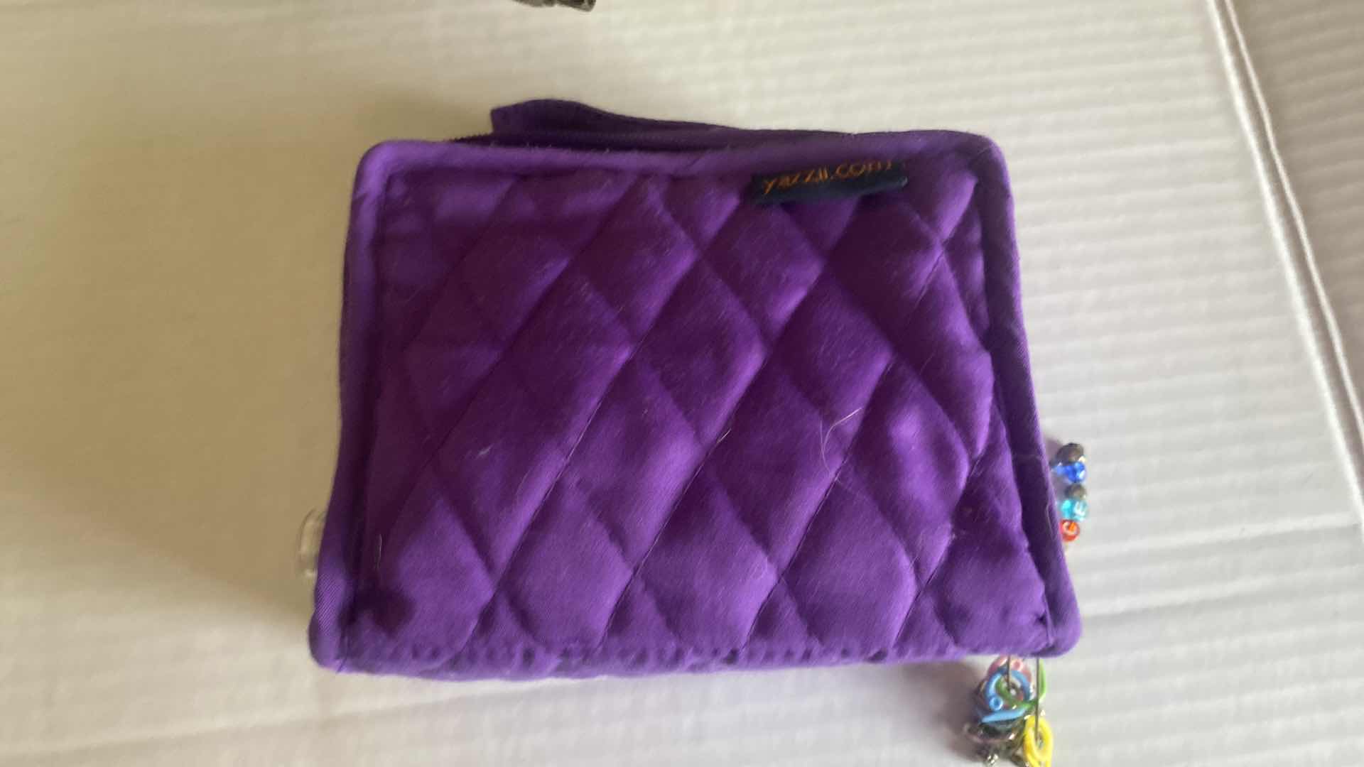 Photo 1 of KNITTING & CROCHETING SUPPLIES -PICKERS, NEEDLES, TOTES AND PURPLE BEAD TOOLS & STORAGE BAG
