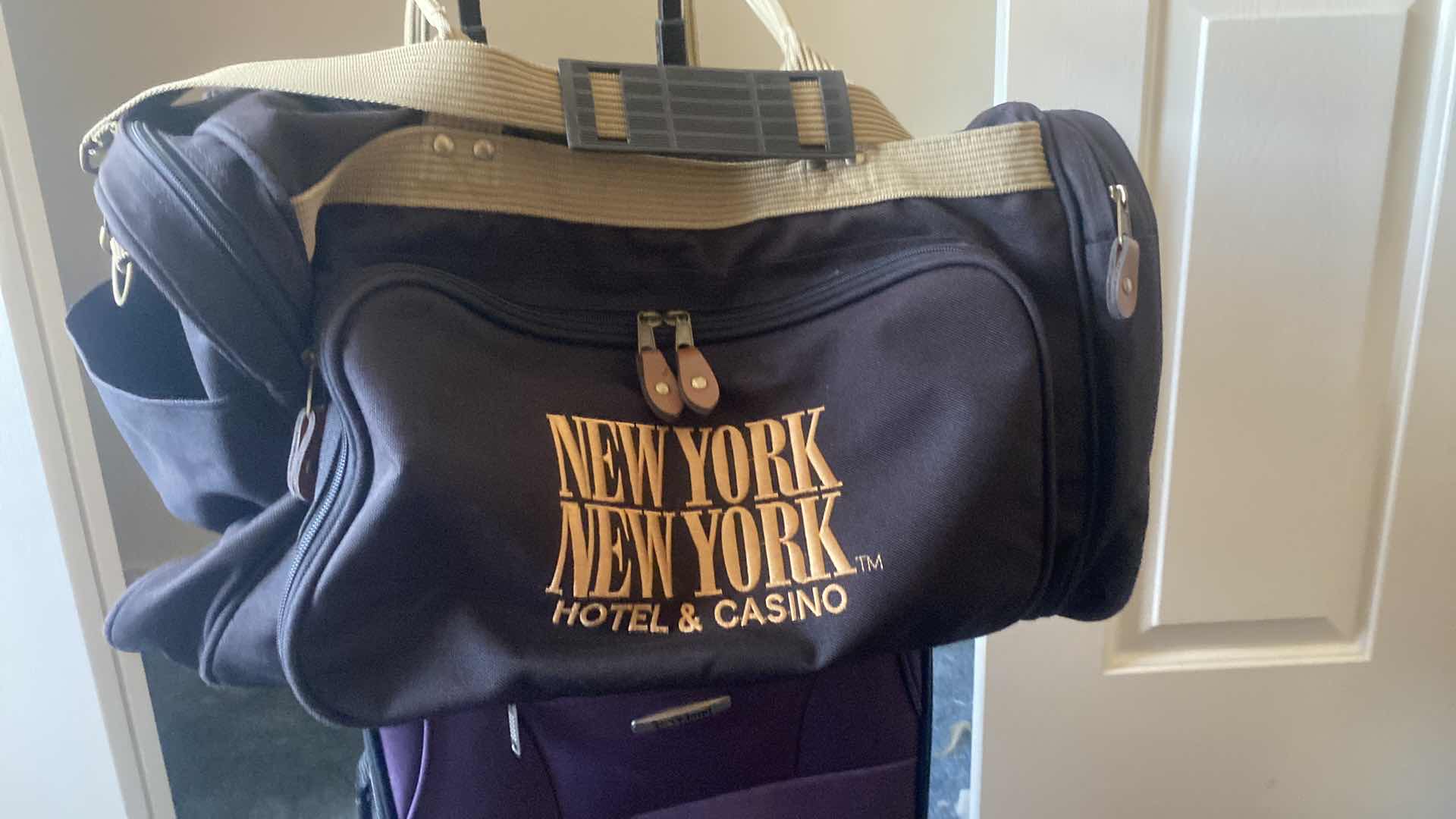 Photo 1 of LARGE ROLLING DUFFEL, NEW YORK NEW YORK, DUFFEL BAG AND ROCKLAND PURPLE ROLL A BOARD H 19”