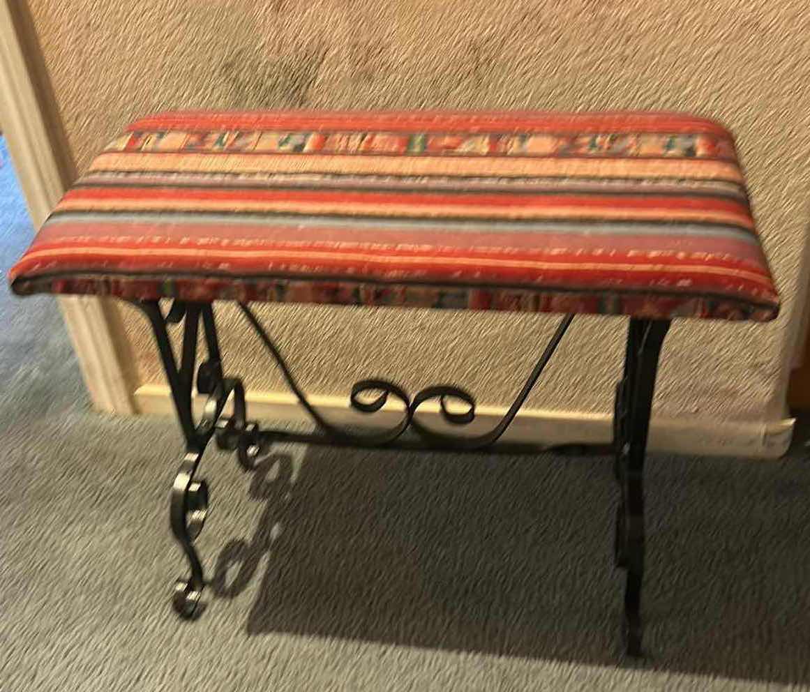 Photo 1 of SPANISH STYLE BENCH FEATURING BLACK SCROLL METAL LEGS AND UPHOLSTERED SEAT . 23” x 11 1/2” x H18 1/2”