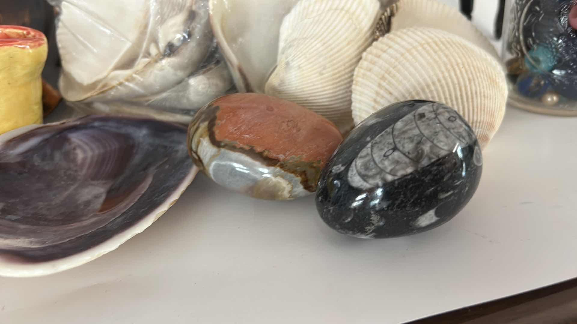 Photo 1 of MISCELLANEOUS HOME DECOR – MARBLES, SHELLS, COPPER BOWL, POLISHED ROCK, AND MORE