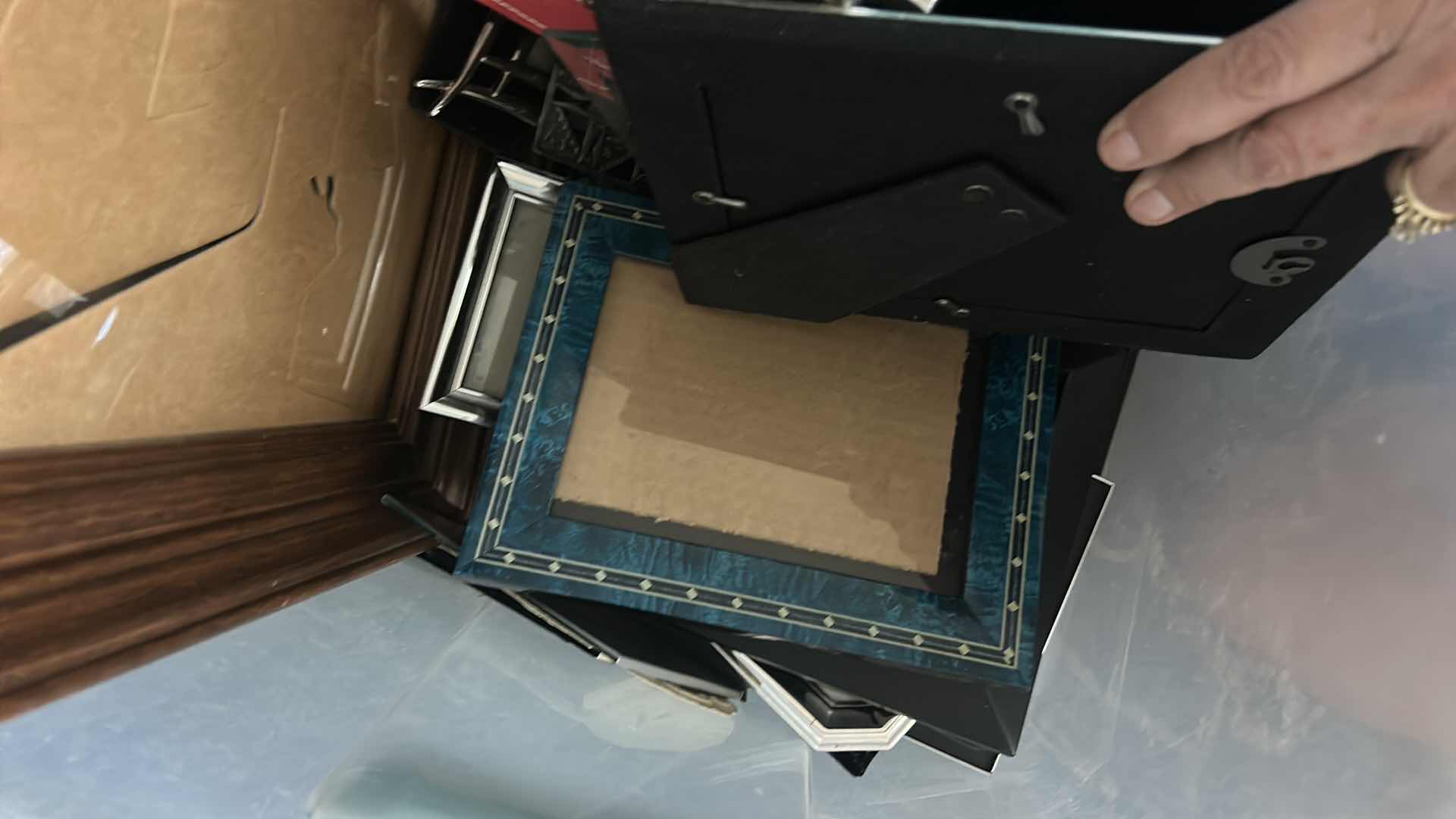 Photo 1 of TOTE FULL OF PICTURE FRAMES