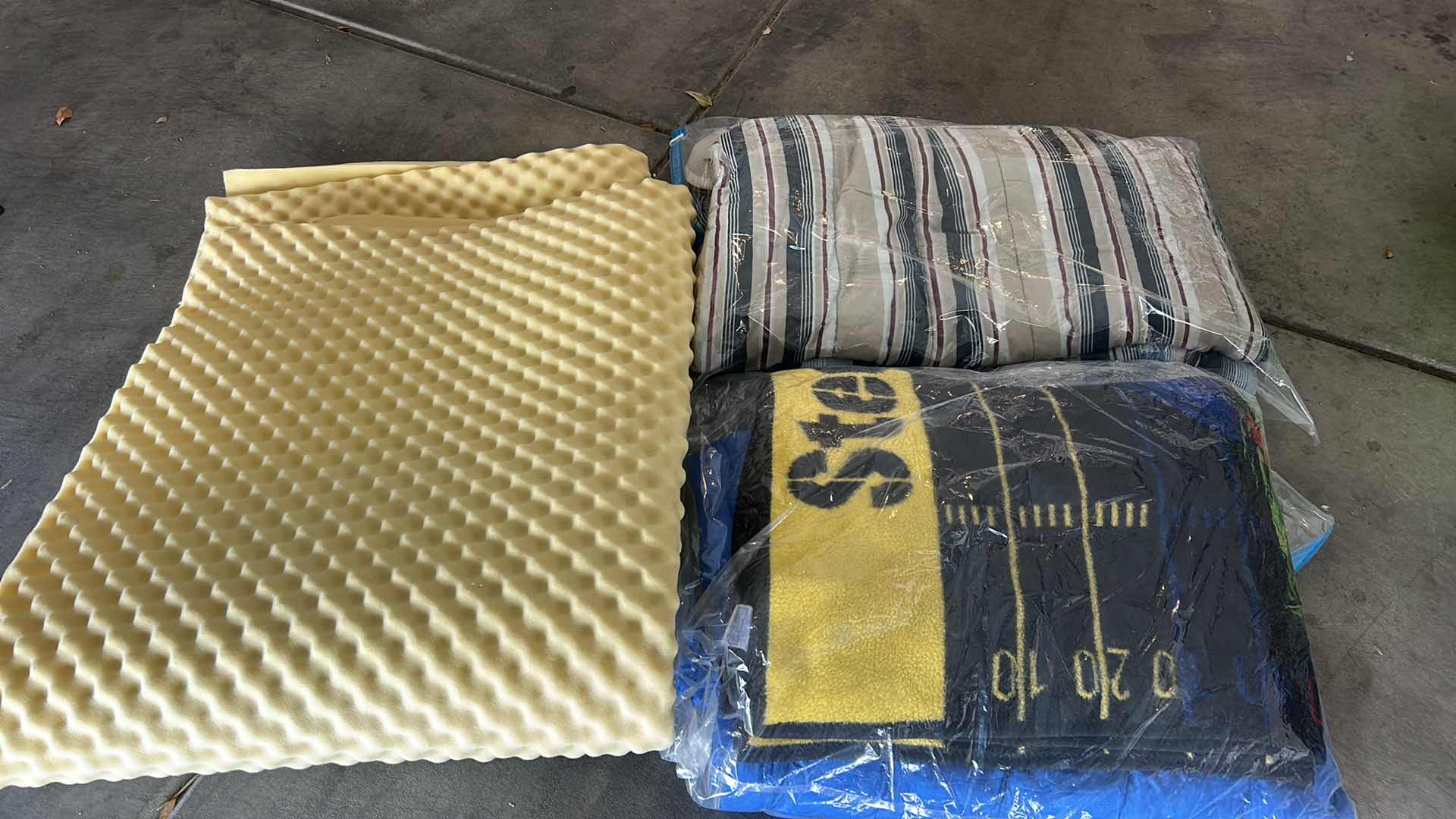 Photo 1 of BEDDING AND FOAM PAD