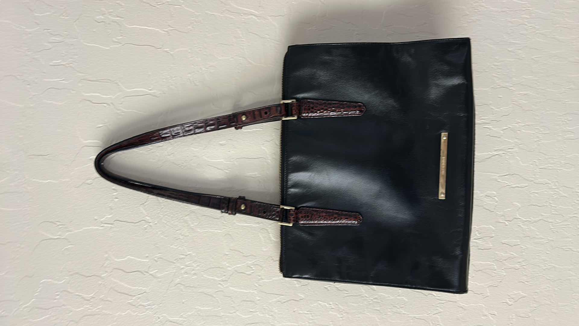 Photo 1 of BLACK LEATHER, BRAHMIN HANDBAG FEATURES, STRIKING, CROC, EMBOSSED CONTRAST TRIM, AND POLISHED GOLD TONE HARDWARE