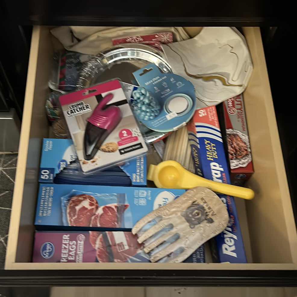 Photo 1 of CONTENTS OF DRAWER IN KITCHEN