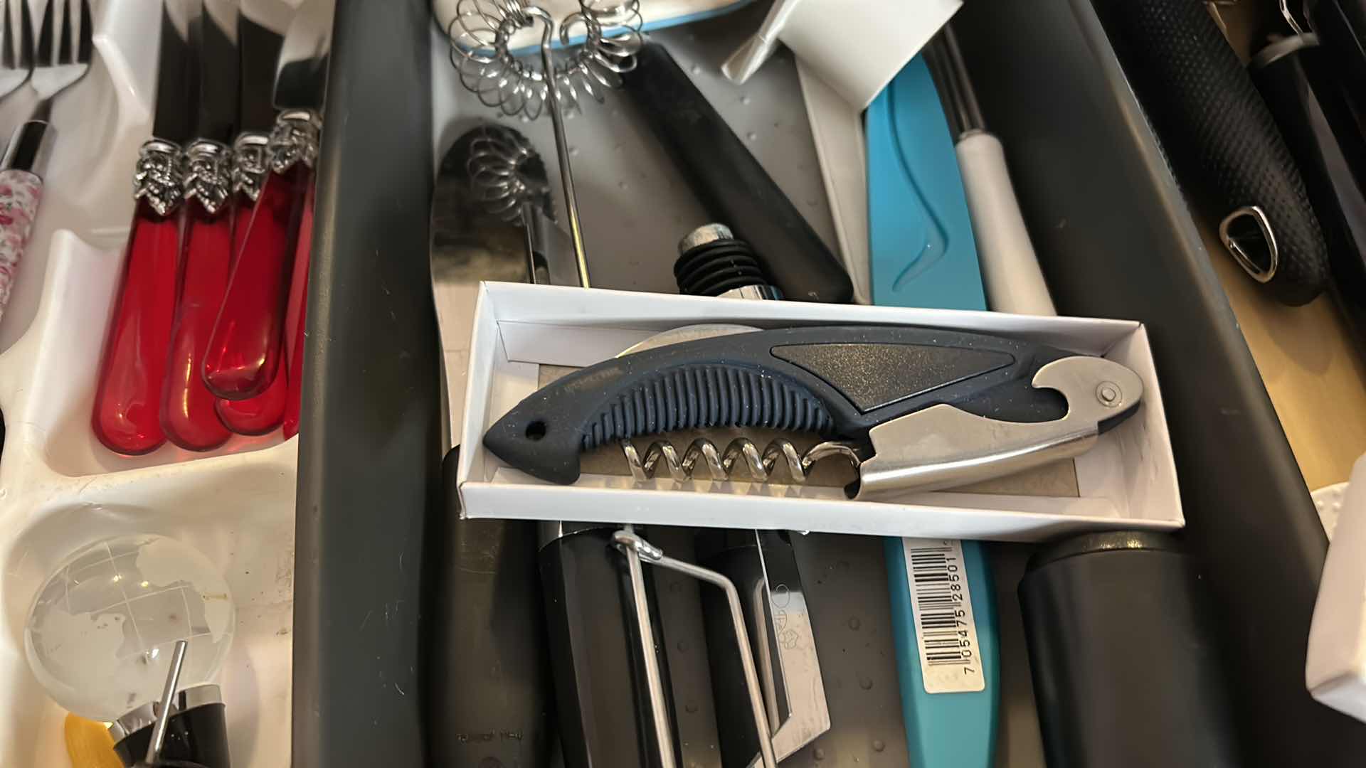 Photo 1 of CONTENTS OF TWO DRAWERS IN KITCHEN