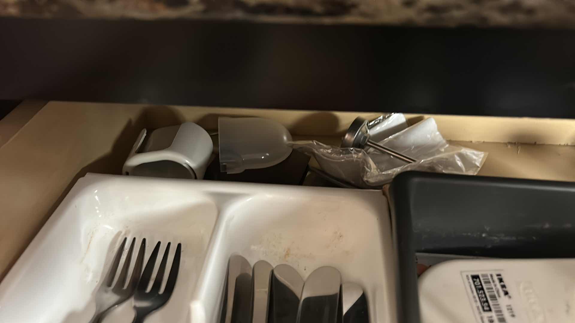 Photo 1 of CONTENTS OF TWO DRAWERS IN KITCHEN