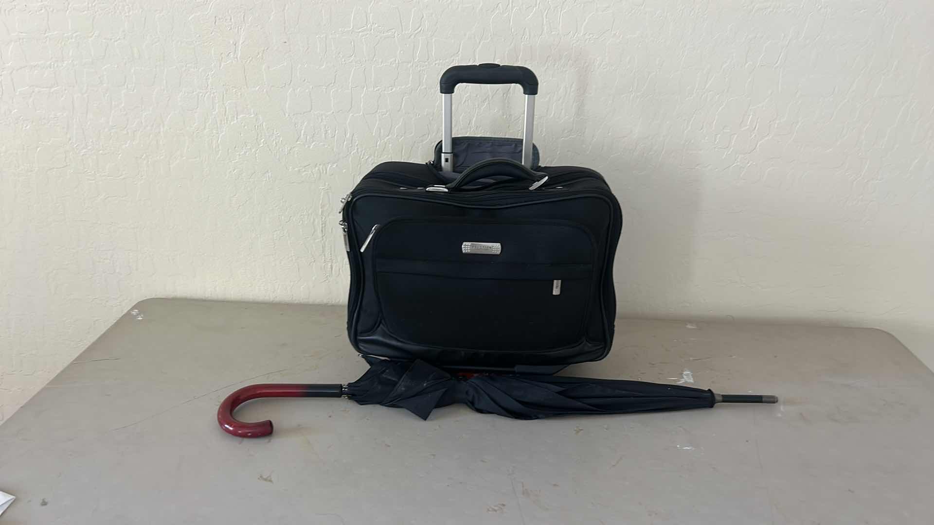 Photo 1 of KENNETH COLE REACTION, LAPTOP, BRIEFCASE WITH A RETRACTABLE HANDLE AND WHEELS AND UMBRELLA