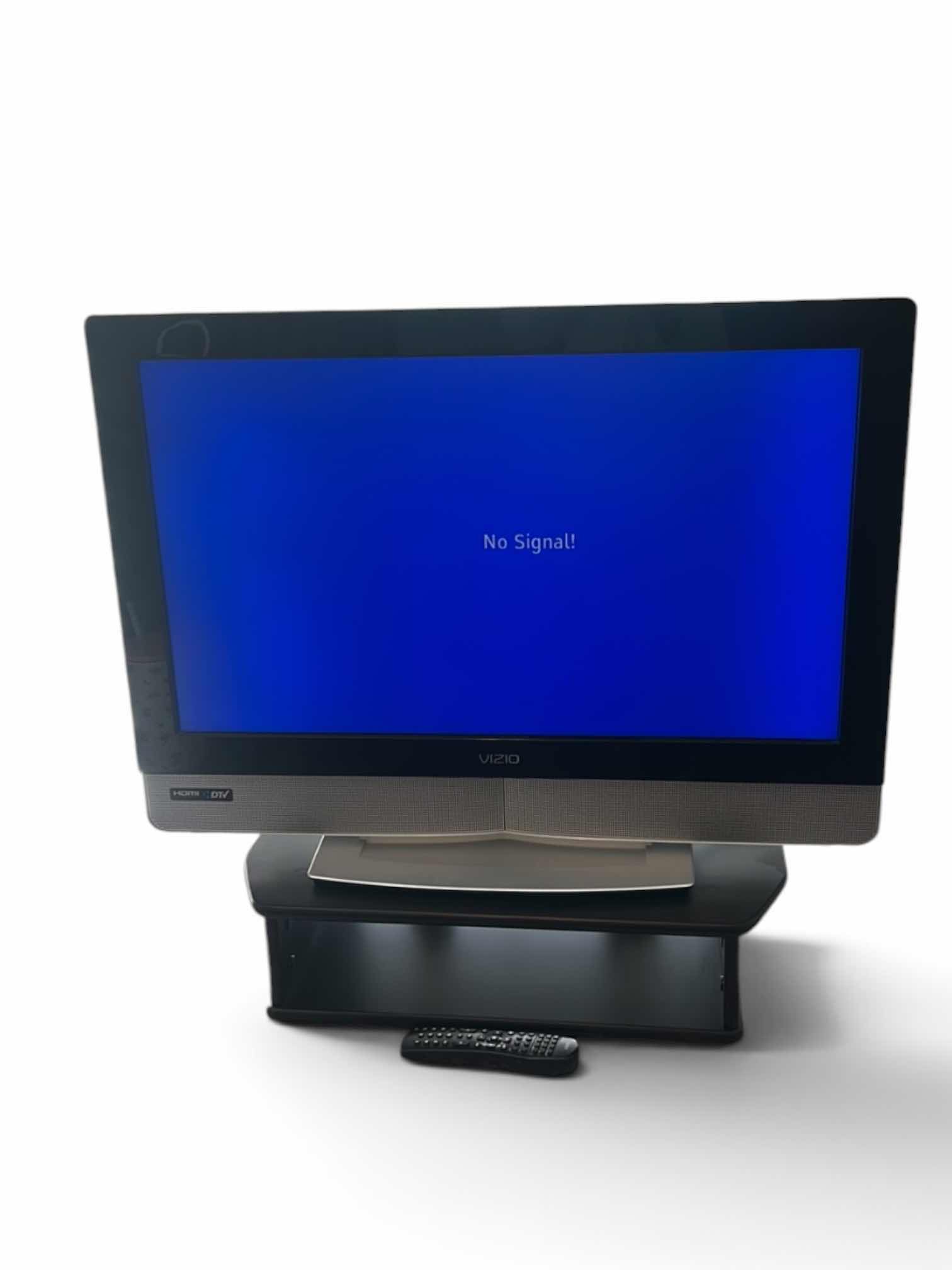 Photo 1 of VIZIO VX32L 32 INCH LCD TELEVISION WITH STAND