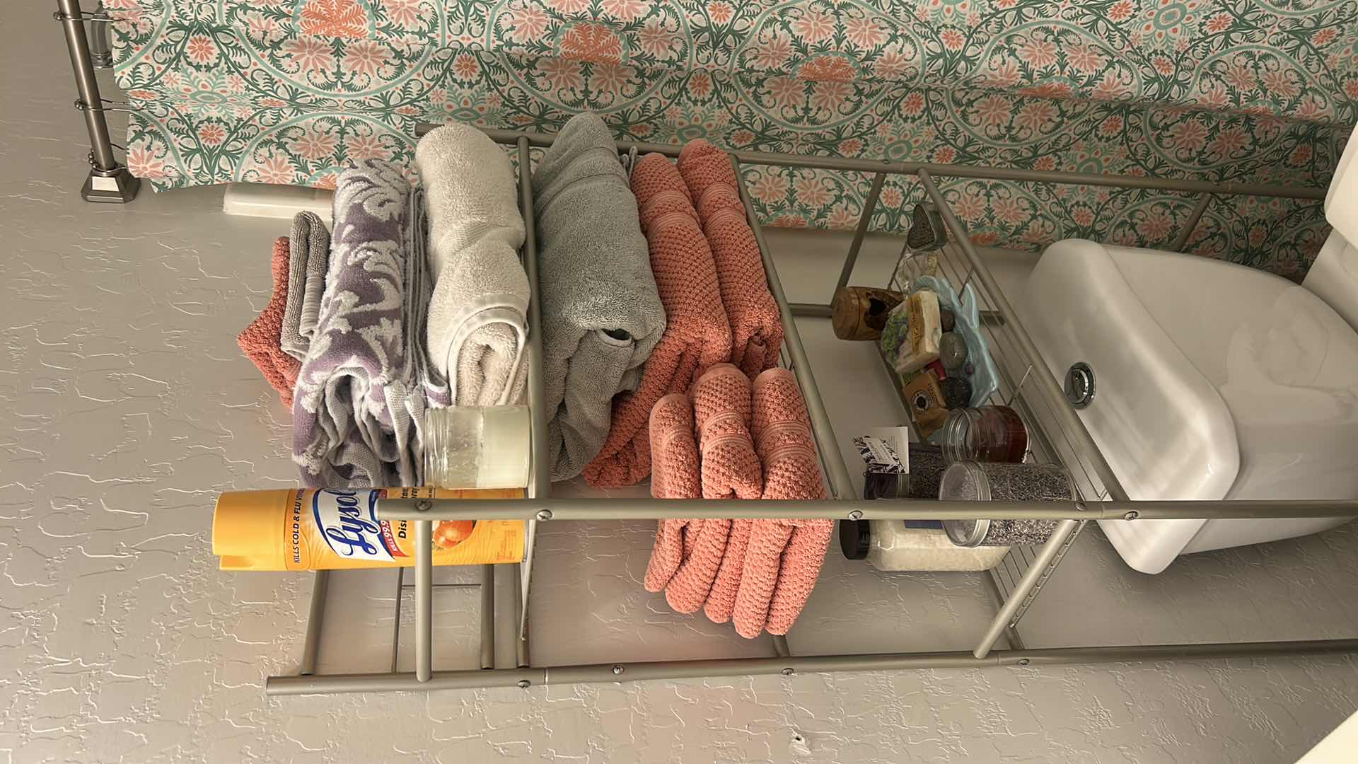 Photo 1 of BATHROOM ENSEMBLE – METAL RACK WITH CONTENTS, SHOWER, CURTAIN AND ROD, TRASHCAN, AND MORE