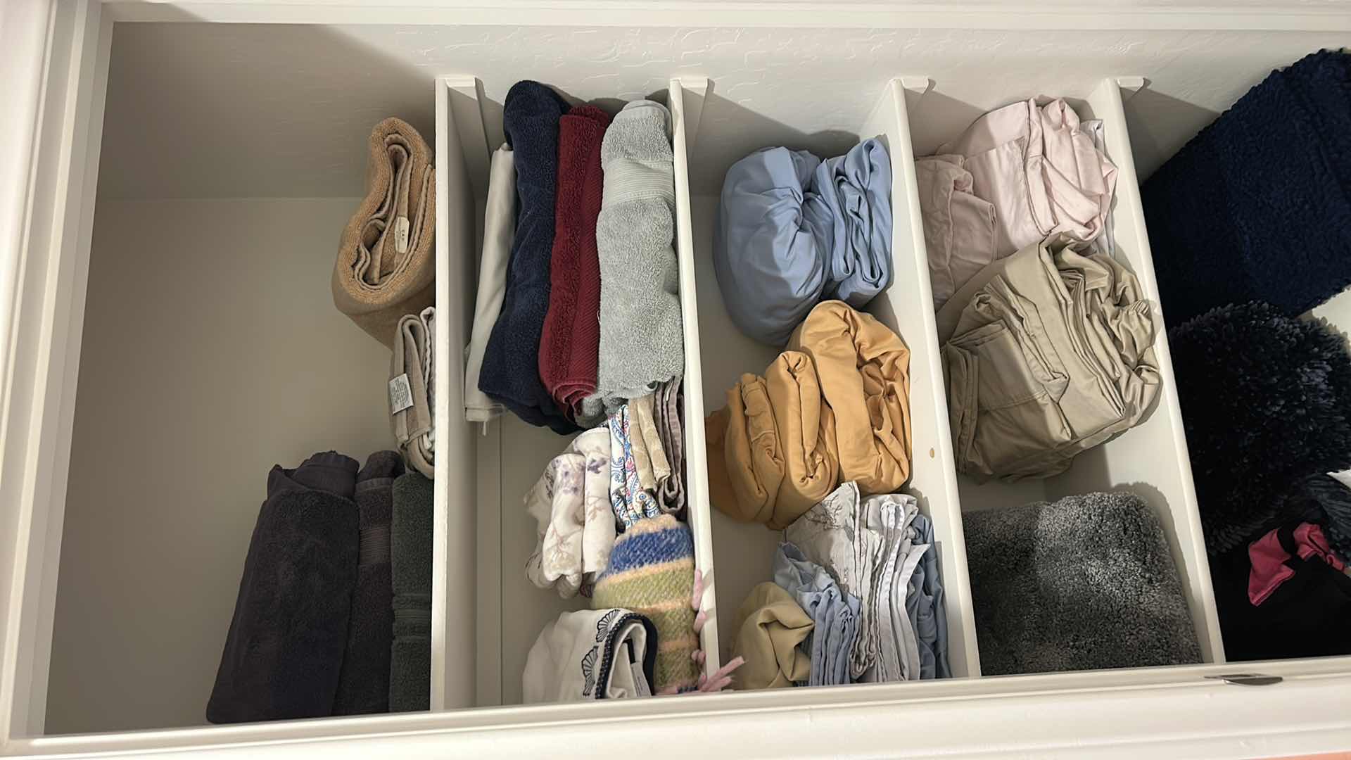 Photo 1 of CONTENTS OF LINEN CLOSET – BEDSHEETS TOWELS, AND MORE