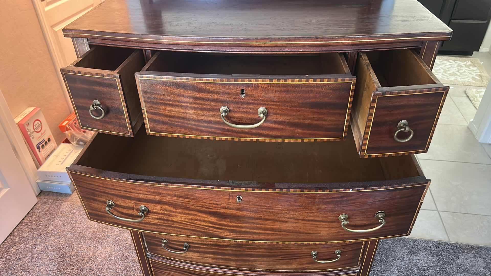Photo 1 of VINTAGE AMERICAN FEDERAL REVIVAL STYLE BOWFRONT CHEST OF DRAWERS WITH AN ACCOMPANYING ATTACHED TILT MIRROR. RICHLY STAINED MAHOGANY VENEERS DECORATED WITH A DISTINCTIVE "BARBER POLE" CHECKERED BAND INLAY ALONG THE BORDERS OF THE DRAWERS. EXPERTLY CRAFTED