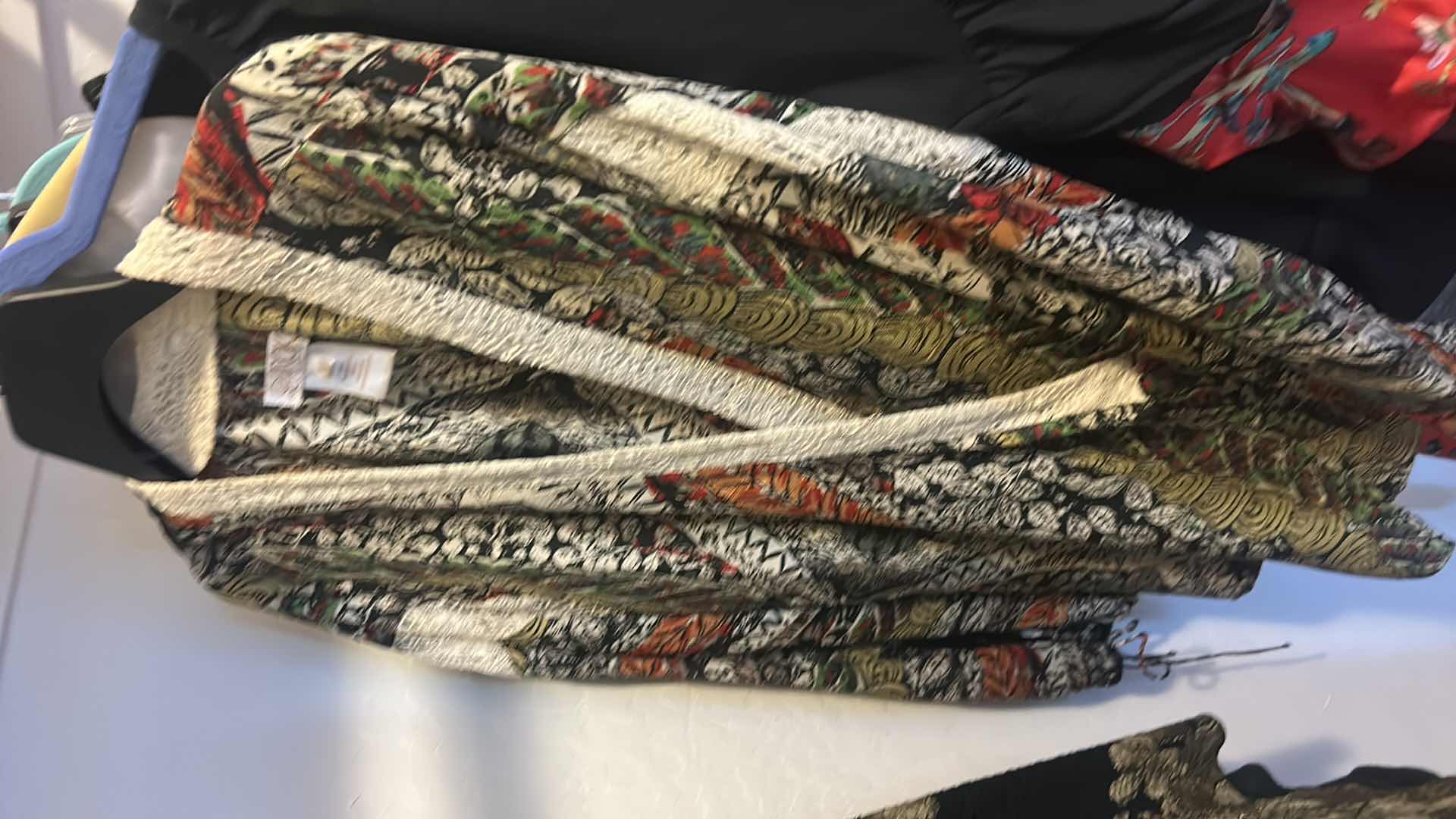 Photo 1 of WOMEN’S PLUS SIZE BLOUSES