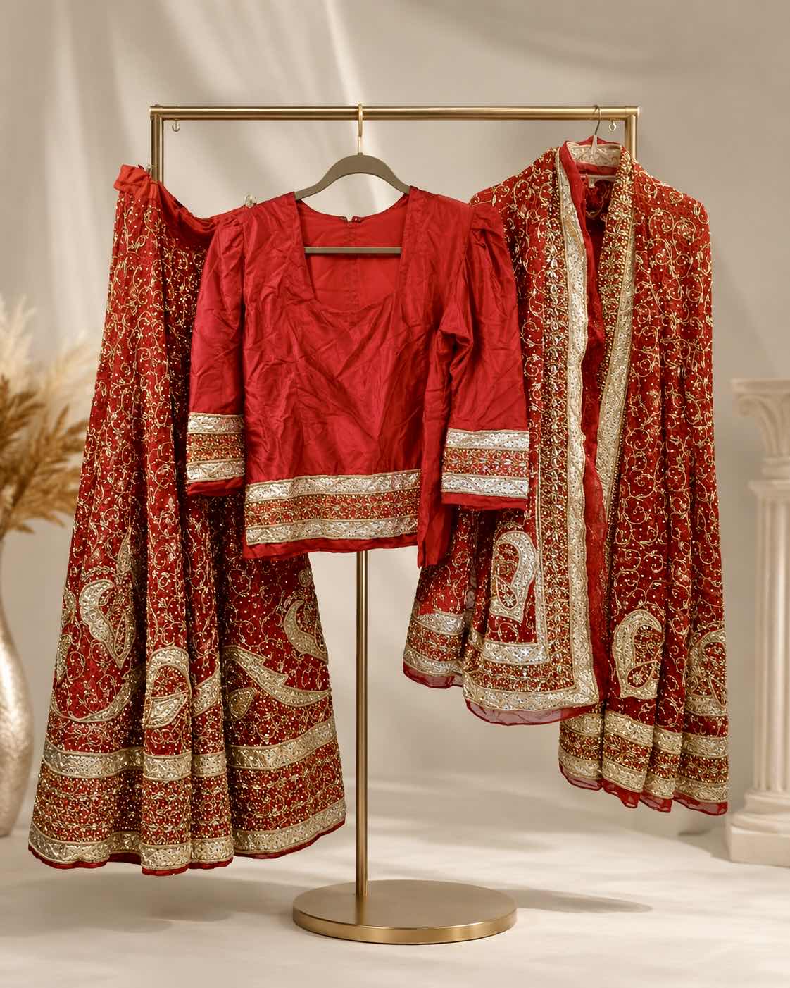 Photo 1 of RED RAW SILK BRIDAL LEHENGA, INSPIRED BY SABYASACHI FEATURING INTRICATE GOLD ZARDOE AND SEQUINS WORK. THE SET INCLUDES A FULLY EMBROIDERED SKIRT, A MATCHING BLOUSE AND A DETAILED DUPATTA, SIZE XL