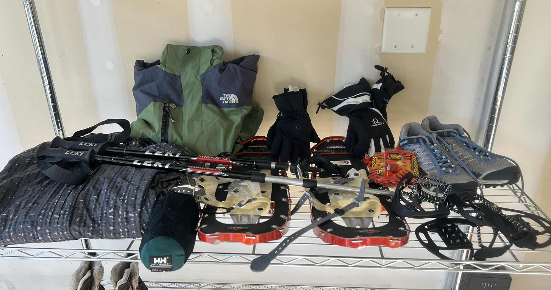 Photo 1 of SNOW SHOES, POLES AND GLOVES, WINTER GARMENTS, AND MORE (SIZE 10 SHOES)