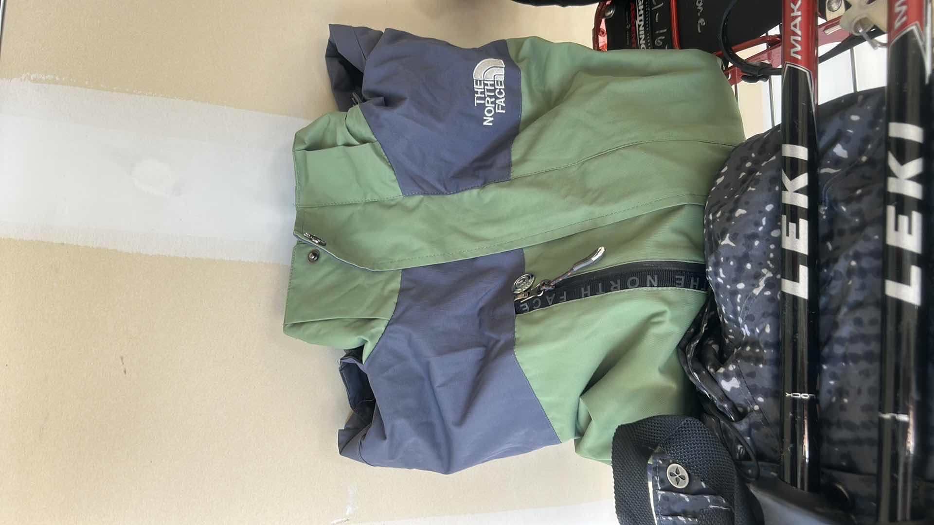 Photo 1 of SNOW SHOES, POLES AND GLOVES, WINTER GARMENTS, AND MORE (SIZE 10 SHOES)