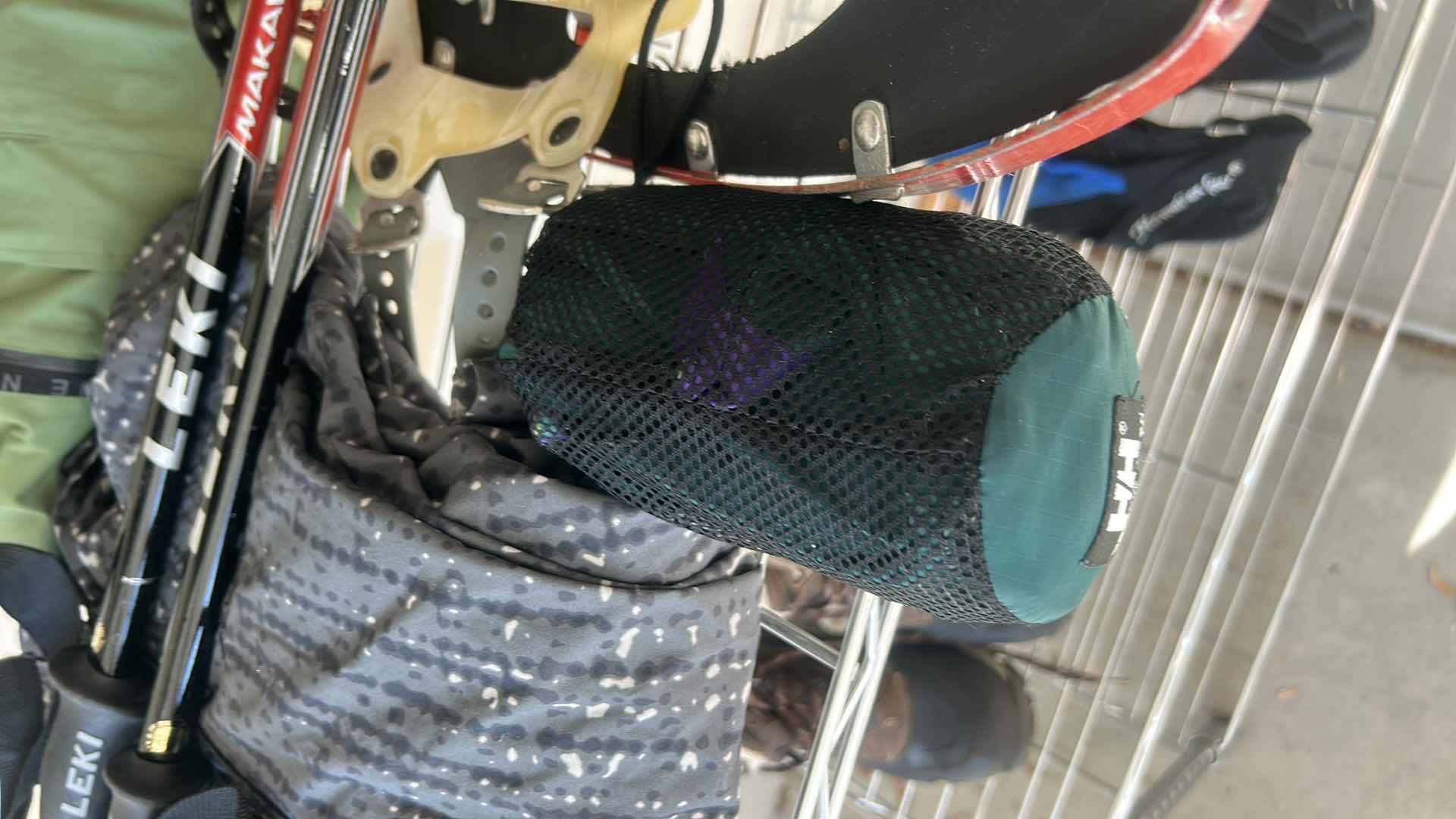 Photo 1 of SNOW SHOES, POLES AND GLOVES, WINTER GARMENTS, AND MORE (SIZE 10 SHOES)